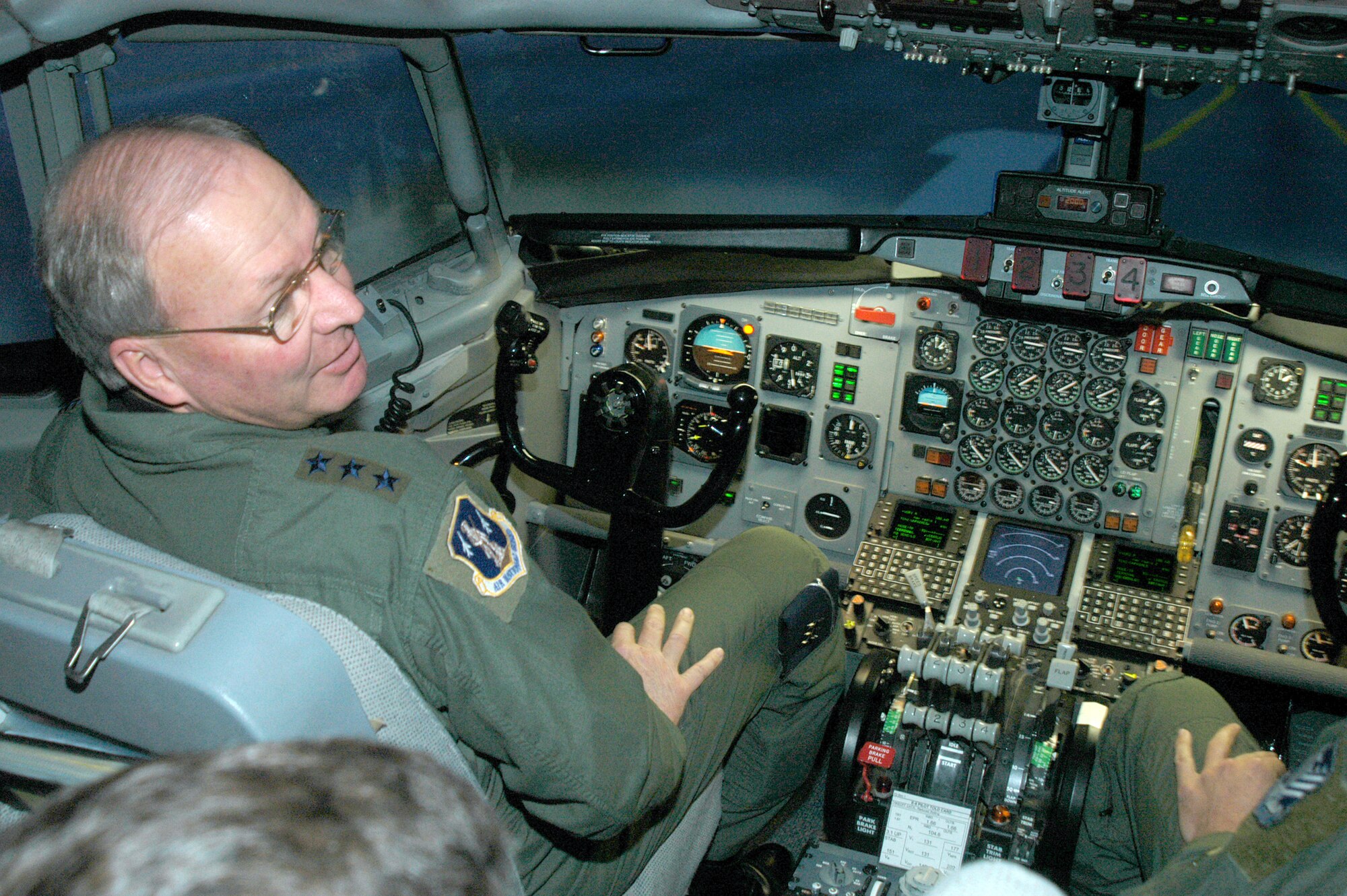 Lt. Gen. Craig McKinley, Director Air National Guard, sits in the 116th Air Control Wing Joint STARS flight simulator, Feb 10.