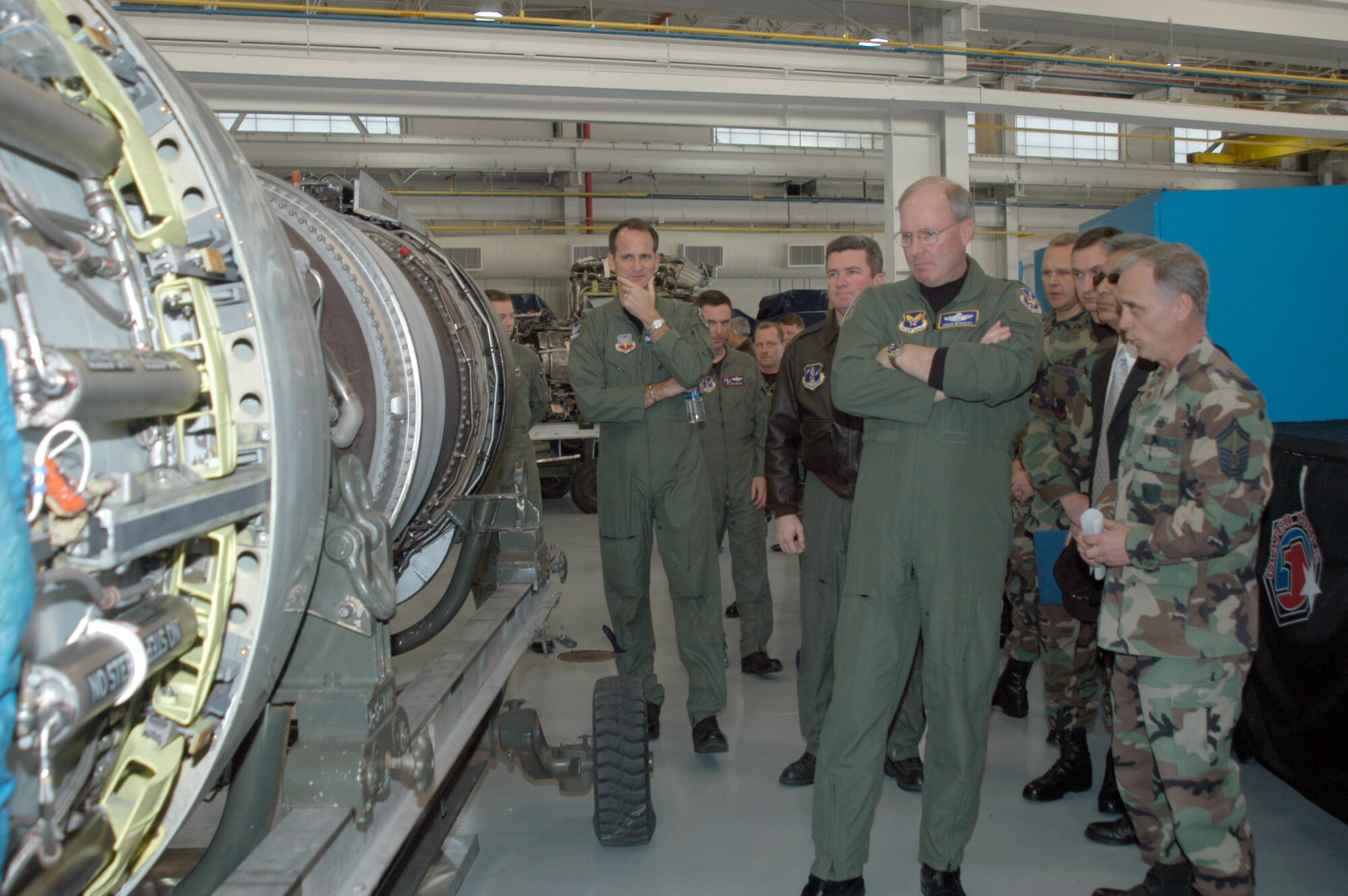 Senior Master Sergeant Jimmy Swartz, Propulsion Fight Chief, briefs Lt. Gen. Craig McKinley, Director Air National Guard, and senior leaders from National Guard Bureau and the 116th Air Control Wing on engine work being accomplished at the wing.                      