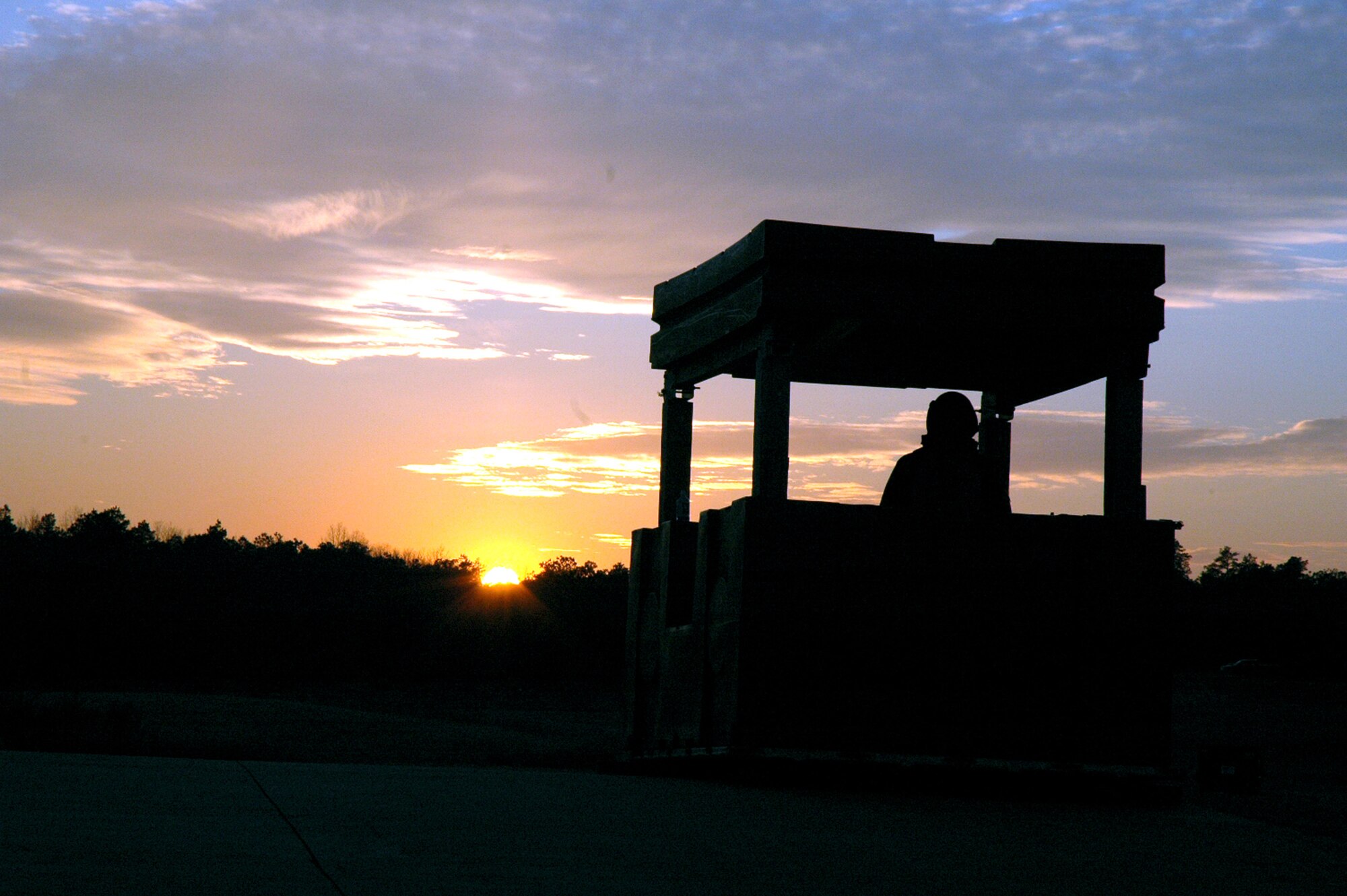 Senior Airman Nicoy Thompson, deployed with the 421st Air Expeditionary Group, watches over perimeter security during operations for Eagle Flag Feb. 11 at the Naval Air Engineering Station in Lakehurst, N.J.  The exercise, operated by the Air Mobility Warfare Center's 421st Combat Training Squadron, is set up to test more than 400 Airmen on expeditionary combat support skills. Airman Thomas is with the 60th Civil Engineer Squadron at Travis Air Force Base, Calif. (U.S. Air Force photo/Tech. Sgt. Scott T. Sturkol)
