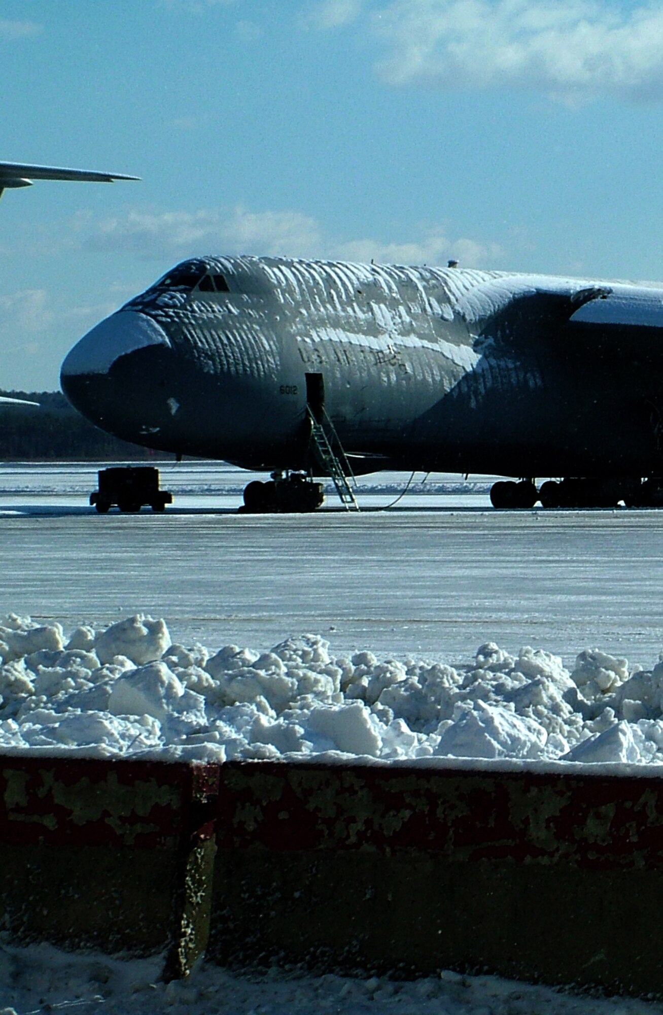 WESTOVER AIR RESERVE BASE, Mass. -- Four inches of snow fell Feb. 2 on the flightline giving the 10 newly assigned C-5Bs a taste of the New England winter. These newer B-models were orignally assigned to Dover Air Force Base, Delaware and where built in the 1980s making for a much younger fleet of 16 C-5s at Westover. 