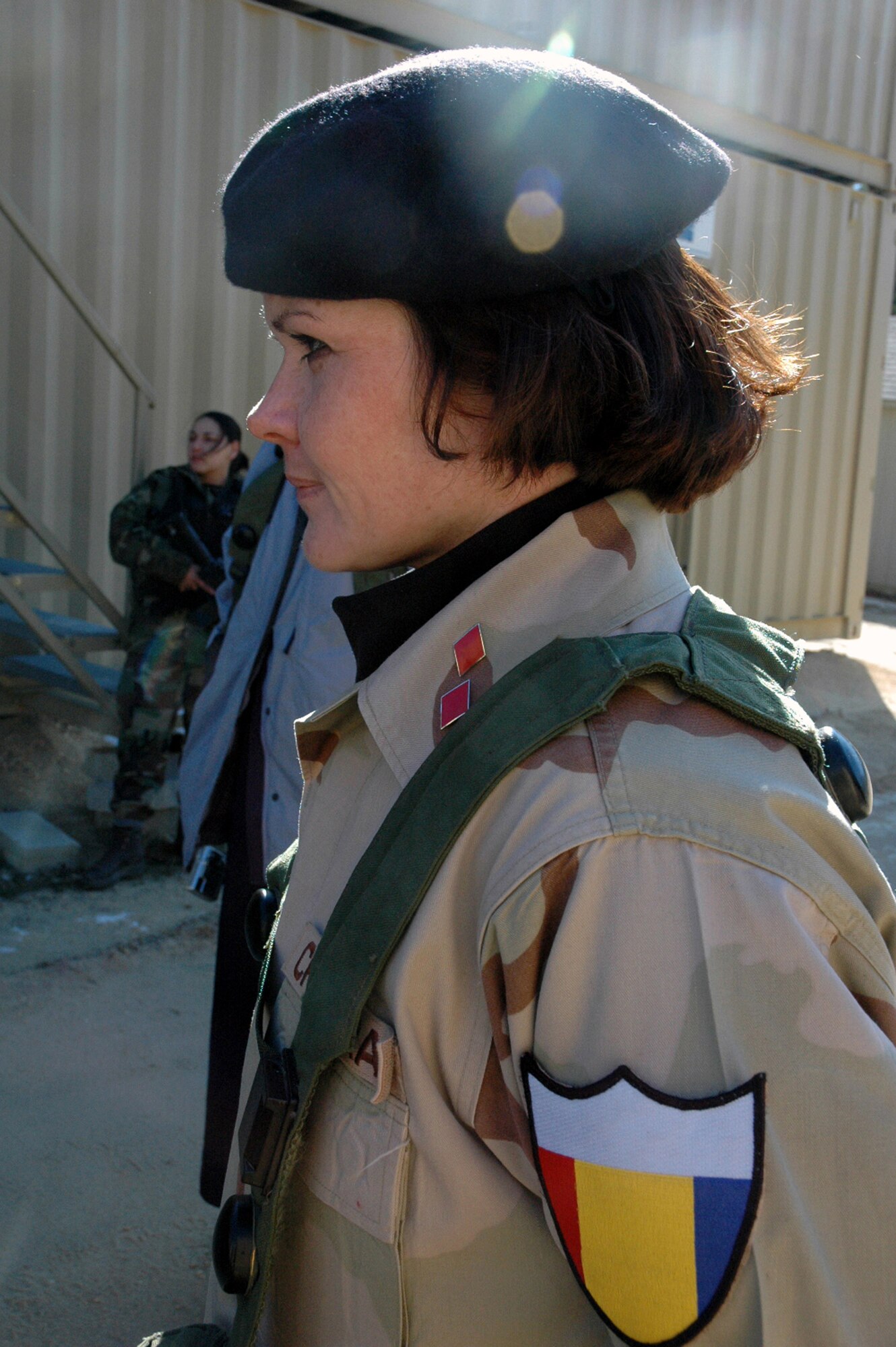 Master Sgt. Patricia Granan plays the role of a military member in the "National Army of Chimaera" during a scenario for exercise Eagle Flag Feb. 9 at the Naval Air Engineering Station in Lakehurst, N.J. The exercise is coordinated by the Air Mobility Warfare Center's 421st Combat Training Squadron from Fort Dix, N.J. The exercise is set up to test Airmen on their expeditionary combat support skills. Sergeant Granan is assigned to the AMWC. (U.S. Air Force Photo/Tech. Sgt. Scott T. Sturkol)