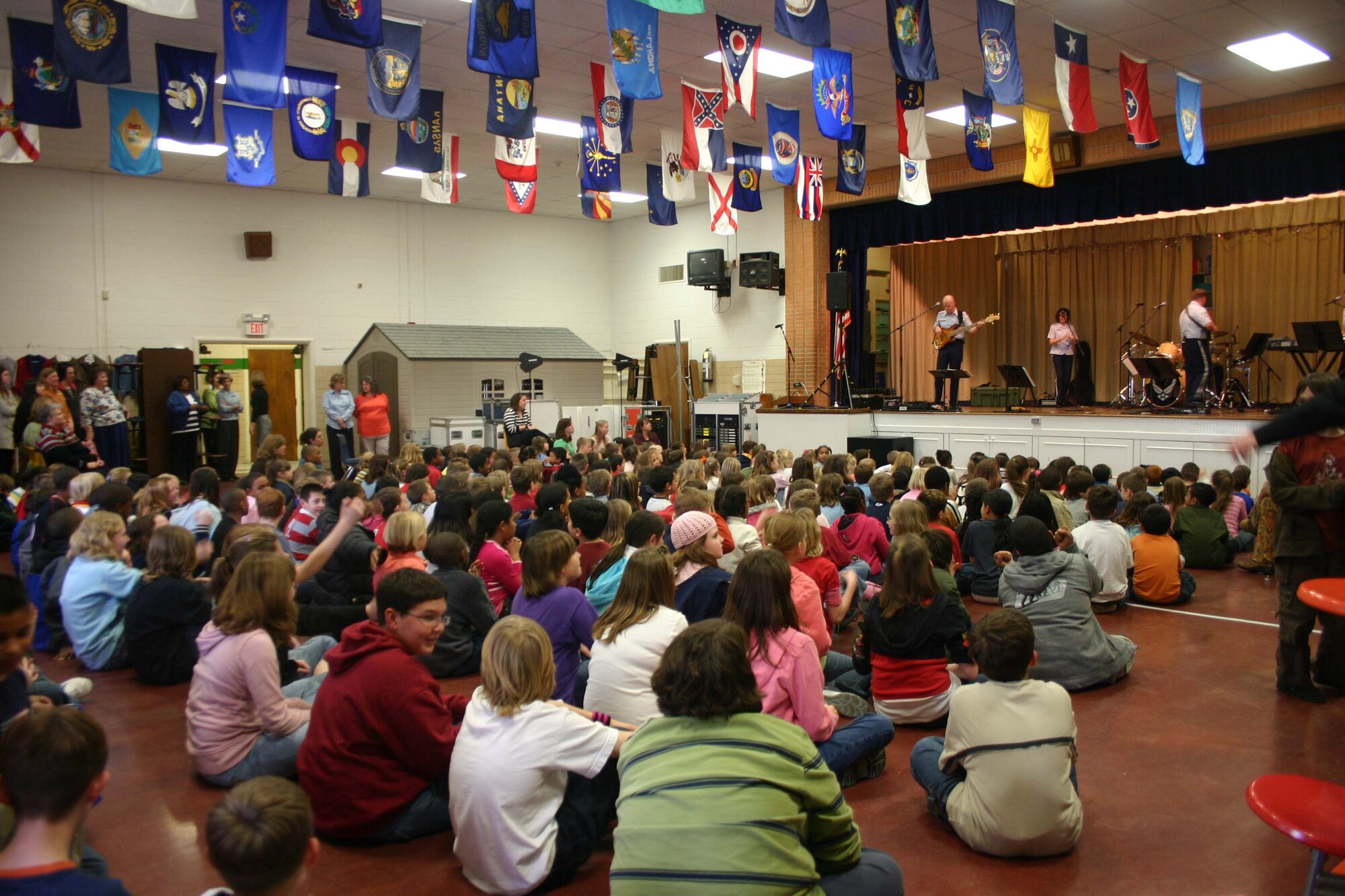 Students at Sheppard Elementary enjoy the mix of contemporary rock and classic R&B from the Air Force Band group Top Flight. (U.S. Air Force Photo/Staff Sgt. Tonnette Thompson)