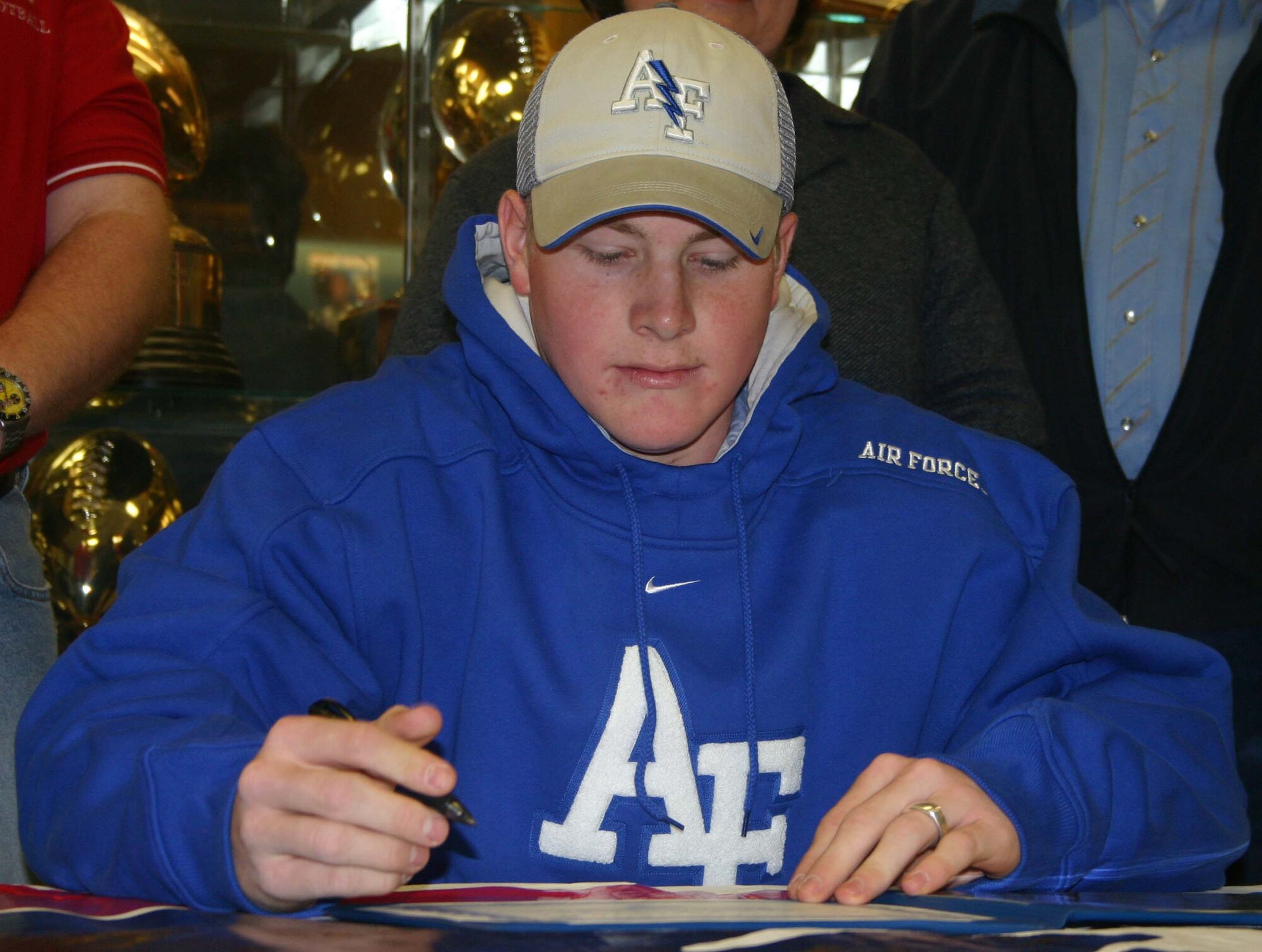 Taylor Huskisson signs up to become the newest Air Force Academy cadet at Wichita Falls Senior High School Feb. 7.  Taylor was selected to attend the academy after a congressional endorsement. (U.S. Air Force Photo/Staff Sgt. Tonnette Thompson)