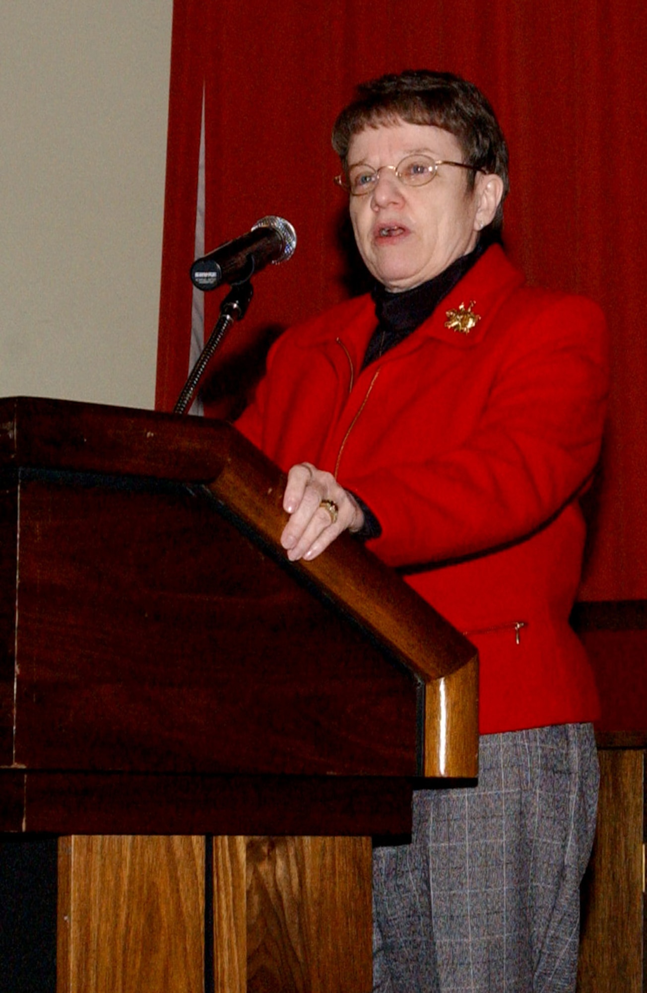 Lorraine Potter, a retired major general who holds the distinction of being the Air Force’s first female chaplain, speaks at the National Prayer Luncheon Feb. 12 at the Galaxy Club on RAF Mildenhall.