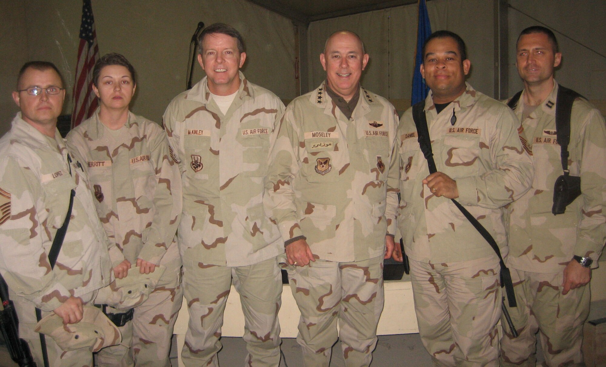 From left: 603rd Air Control Squadron members Senior Master Sgt. Chris Lopez, Tech. Sgt. Melissa Merrit, Senior Master Sgt. David Daniel and Capt. Rob Biggers visit with Chief Master Sgt. of the Air Force Rodney McKinley (center) and Air Force Chief of Staff Gen. T. Michael Moseley (center.) The senior leaders stopped at Kandahar Air Base, Afghanistan, during a recent tour downrange. (Courtesy photo)