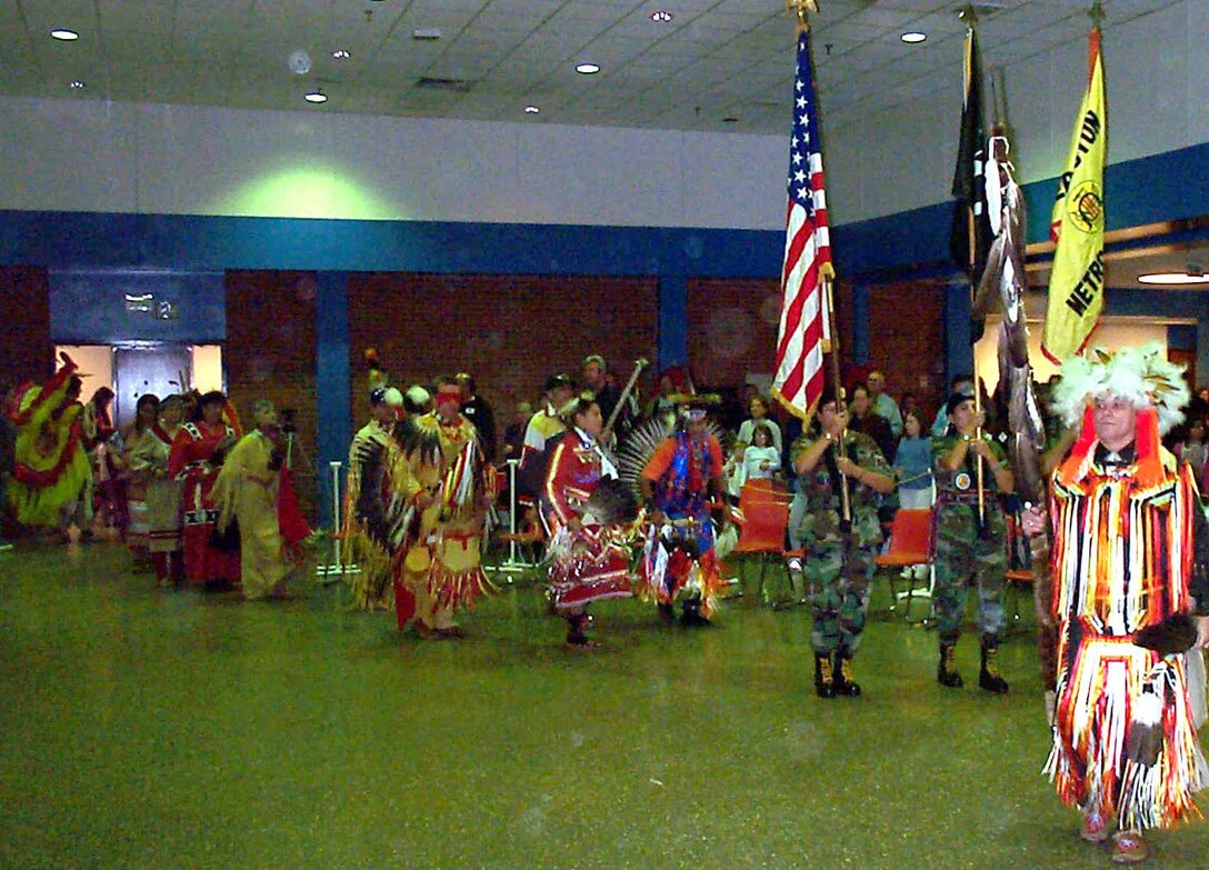Doug Hall of the Odawa tribe of Minnesota leads the grand entry  procession into the ceremonial areas during the American Indian Intertribal  Cultural Organization Second Annual Veterans Powwow celebration, held at  Central Middle School in Edgewater, Md., Nov. 8. Photo by Rudi Williams