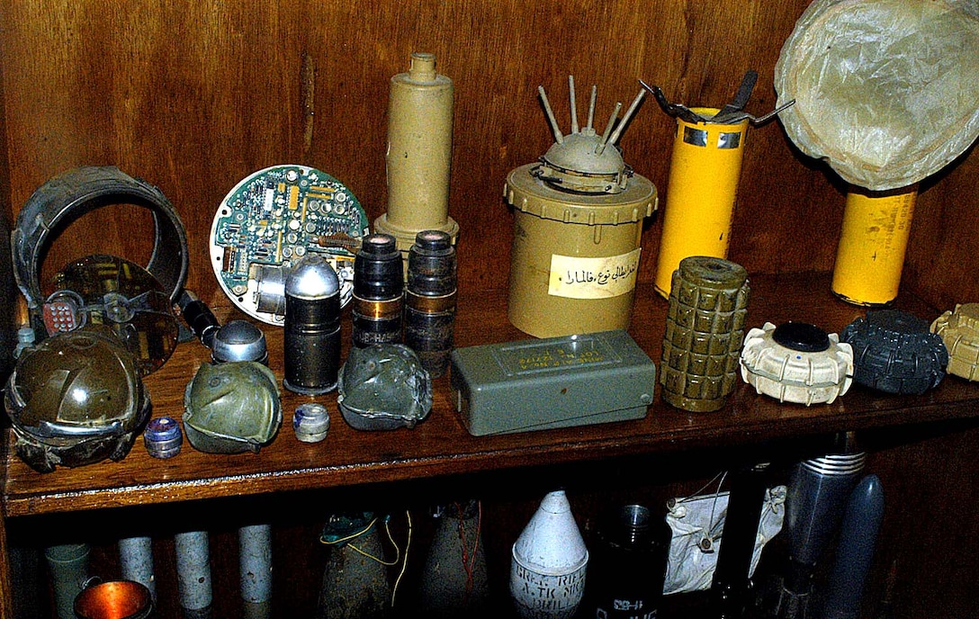 A stash of various improvised explosive  devices found by members of the Mosul Fire Department sits  on display at the new Nineveh Civil Defense Headquarters in  Mosul. Coalition forces have taught Mosul's firefighters  not only to protect citizens from fires, but also to keep a  watch for other dangers, such as explosives on the streets.  Photo by Pfc. Chris Jones, USA