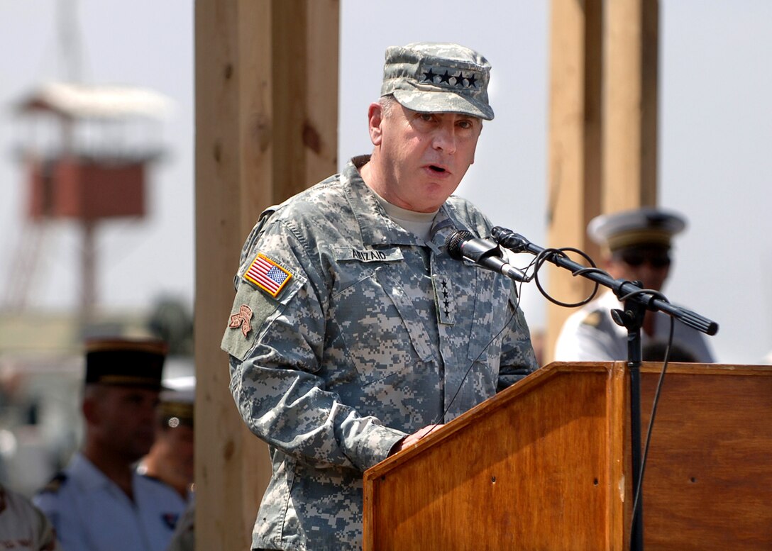 U.S. Army Gen. John Abizaid, commander, U.S. Central Command, lauds the hard work of servicemembers of Combined Joint Task Force - Horn of Africa, during the change of command ceremony at Camp Lemonier, Djibouti, Feb. 14, 2007. 