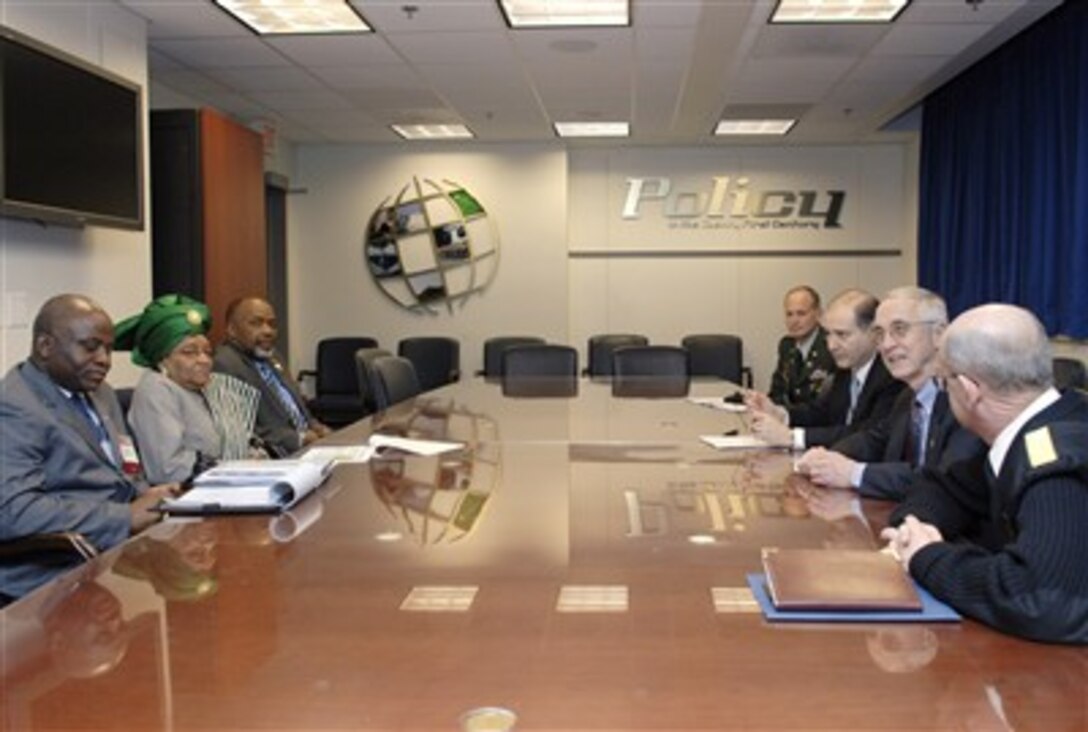 Deputy Secretary of Defense Gordon England, second from right, meets with Liberian President Ellen Johnson Sirleaf, second from left, at the Pentagon, Feb. 15, 2007, to discuss the United States establishment of Africa Command.