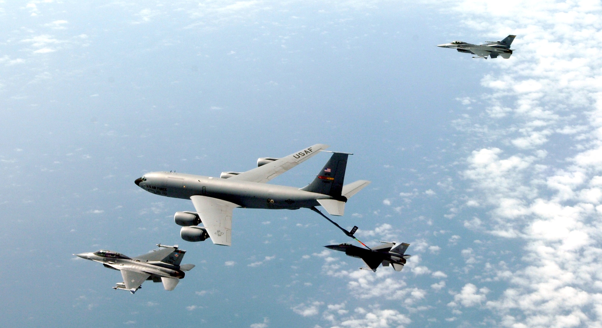 An F-16 Fighting Falcon refuels from a KC-135 Stratotanker over Peru in support of the Falcon and Condor 2007, a joint exercise between the U.S. and Peruvian Air Forces. The exercise allows the U.S. military to build relationships with military and civilian leaders of Peru. The F-16 is from the 34th Fighter Squadron at Hill Air Force Base, Utah, and the KC-135 is assigned to the 336th Air Refueling Squadron at March Air Reserve Base, Calif. (U.S. Air Force photo/Tech. Sgt. Eric Kreps)