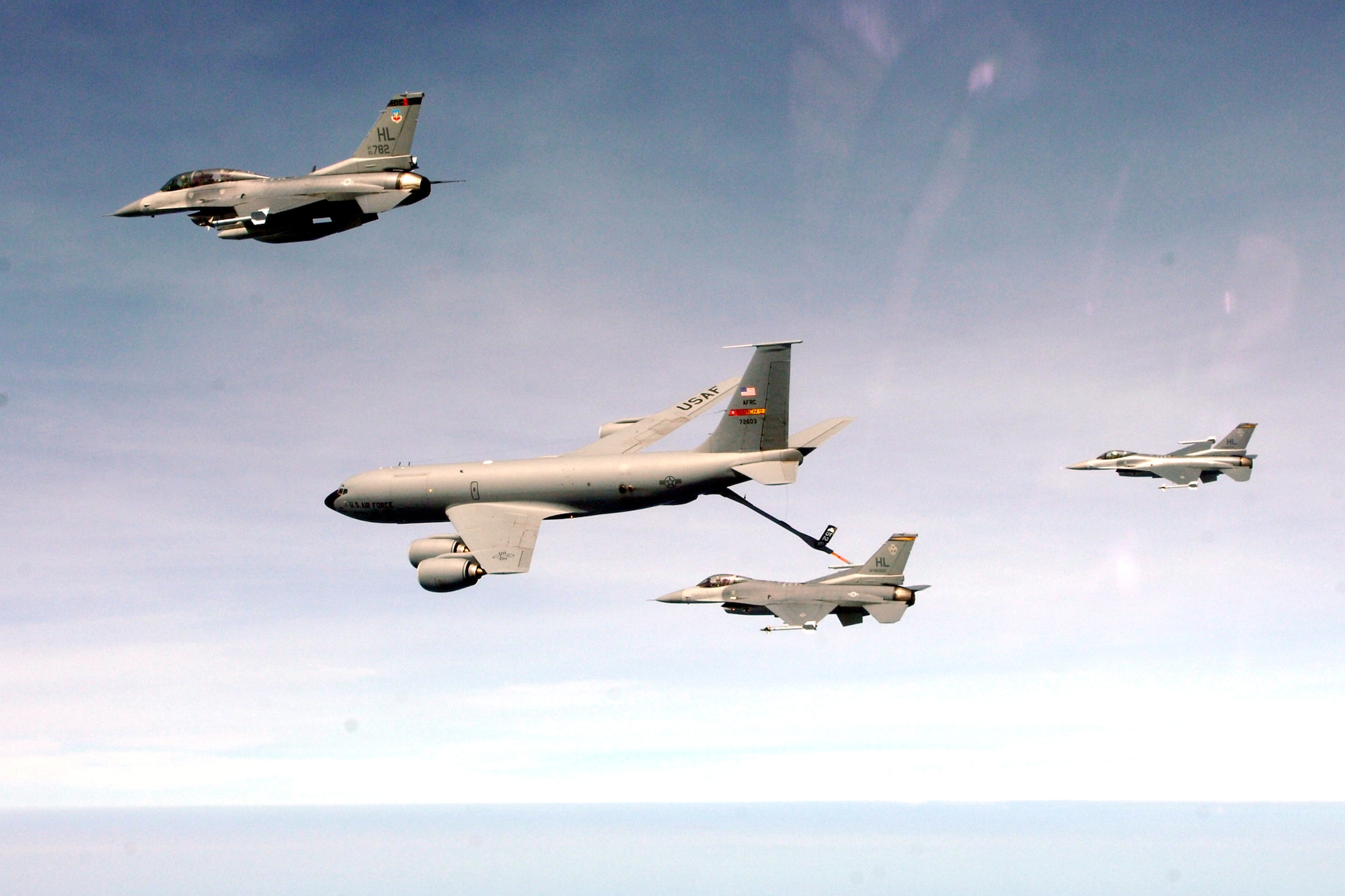 An F-16 Fighting Falcon refuels from a KC-135 Stratotanker over Peru in support of the Falcon and Condor 2007, a joint exercise between the U.S. and Peruvian Air Forces. The exercise allows the U.S. military to build relationships with military and civilian leaders of Peru. The F-16 is from the 34th Fighter Squadron at Hill Air Force Base, Utah, and the KC-135 is assigned to the 336th Air Refueling Squadron at March Air Reserve Base, Calif. (U.S. Air Force photo/Tech. Sgt. Eric Kreps)