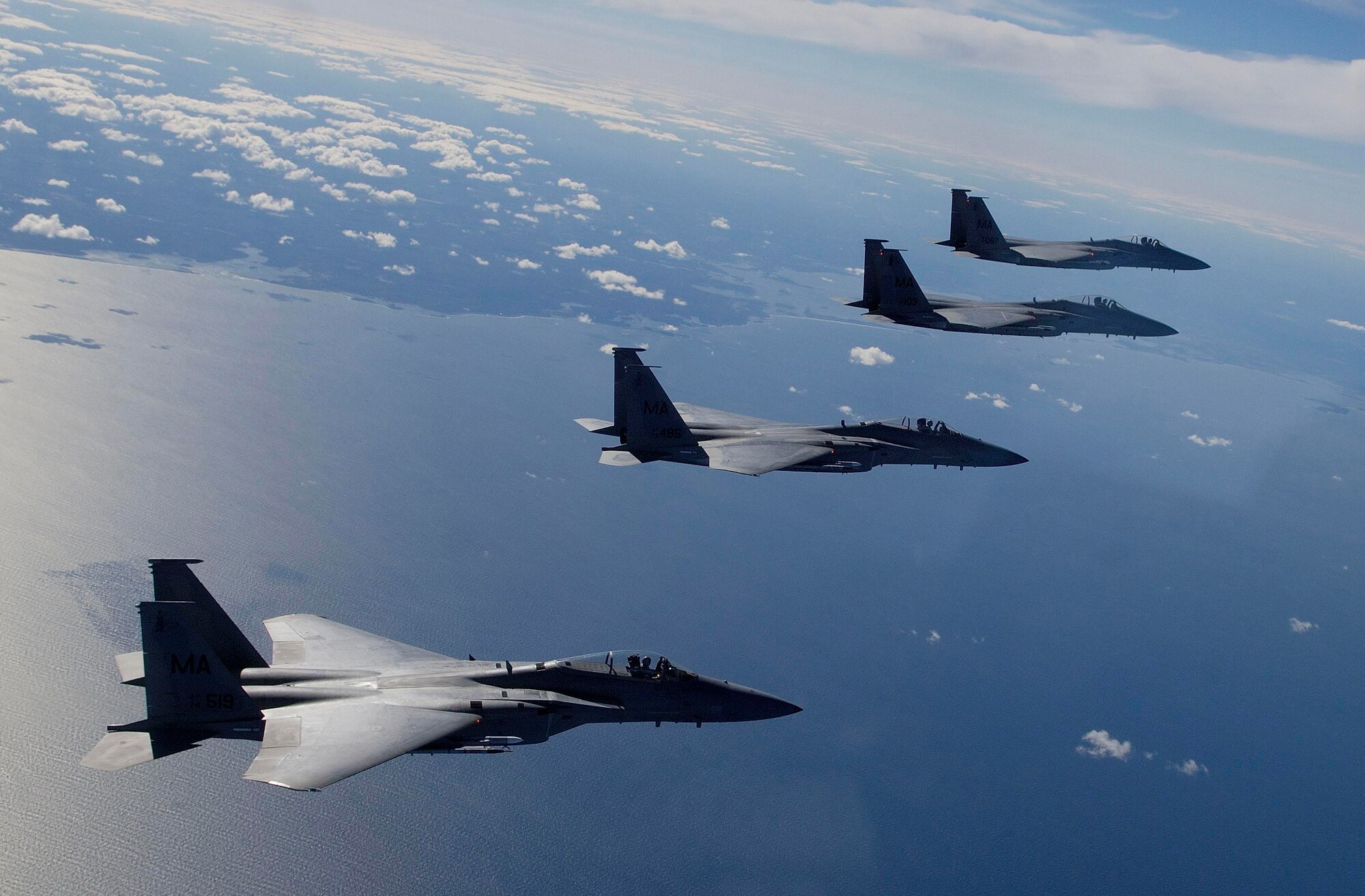 F-15 Eagles, like these flying over Cape Cod, are extremely maneuverable, tactical fighters designed to permit the Air Force to gain and maintain air supremacy over the battlefield.  (U.S. Air Force photo/Staff Sgt. Samuel Rogers)