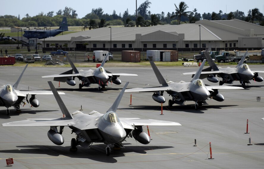 HICKAM AIR FORCE BASE, Hawaii -- F-22 Raptors sit on the flight line at Hickam Air Force Base, Hawaii Feb. 12, 2007. The F-22’s and more than 250 Airmen from the 27th Fighter Squadron at Langley Air Force Base, Va., are bound for Kadena Air Base, Japan, for the aircraft’s first overseas operational deployment. (U.S. Air Force photo/ Tech. Sgt. Shane A. Cuomo)