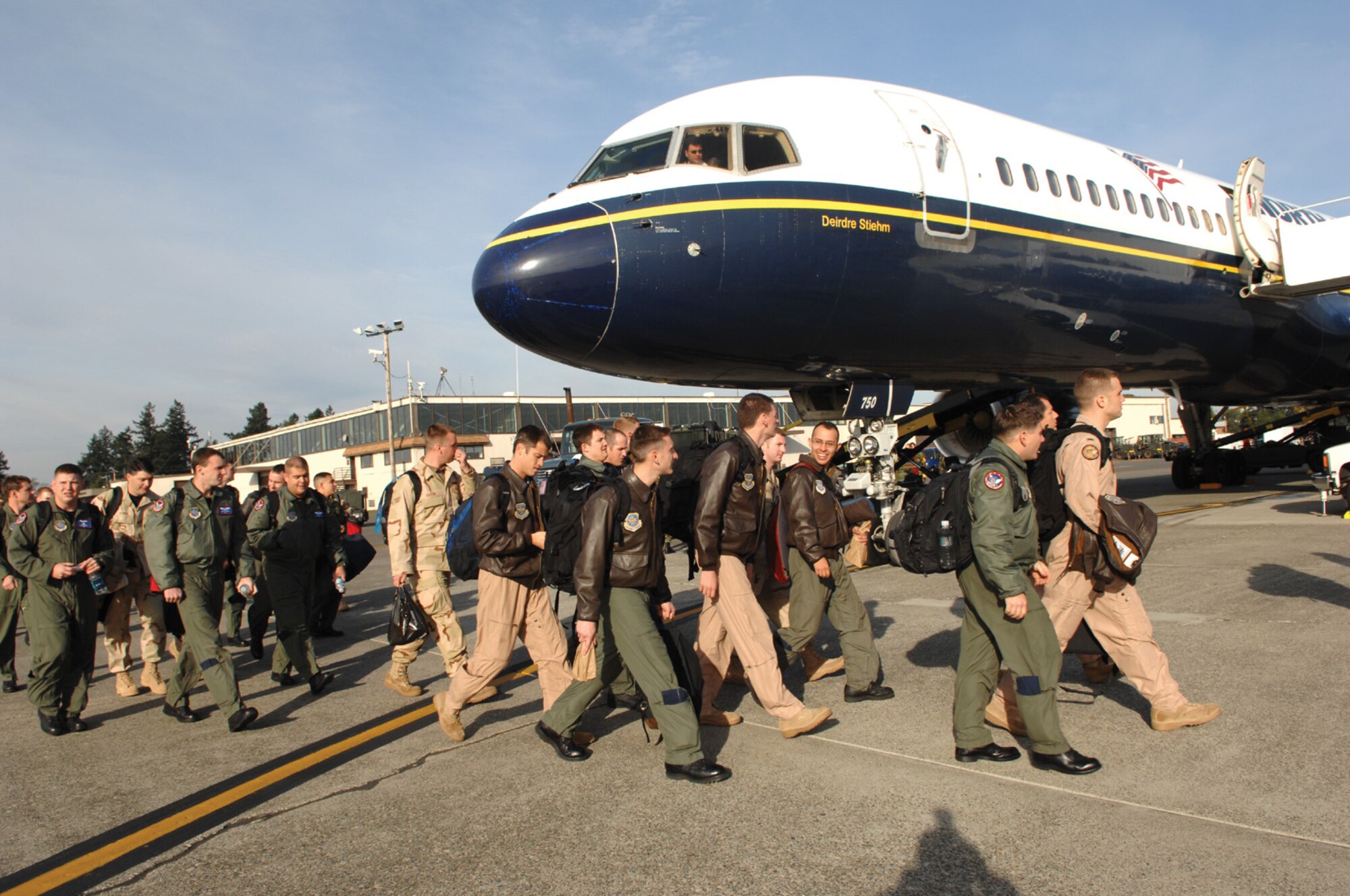 MCCHORD AIR FORCE BASE, Wash., --
Members of the 4th Airlift Squadron prepare to board a commercial aircraft on McChord?s flightline in November enroute to Turkey as part of their deployment.
(U.S. Air Force Photo/Abner Guzman)
