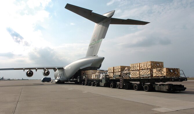 MCCHORD AIR FORCE BASE, Wash., --
Pallets of cargo are off-loaded from a C-17 Globemaster III in support of OIF. Airmen from the 817th EAS have transported cargo on more than 1, 211 combat sorties. (U.S. Air Force photo)
