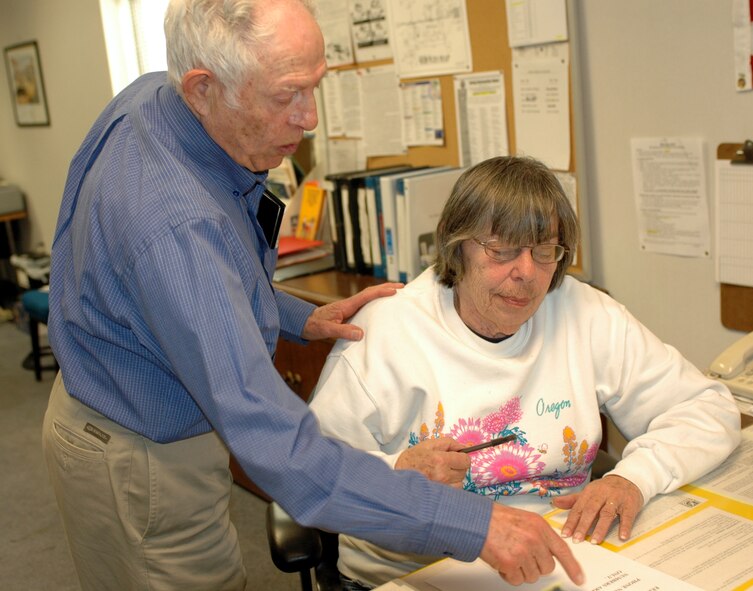 Mr. Joe Rowan, director of the Travis Retiree Activities Office, discusses Retiree Appreciation Day events with Ms. Joan White, RAO volunteer. As director, Mr Rowan’s duties range from providing a continuous update of helpful information to the Air Force retirees who reside in Travis’ assigned area of responsibility to providing volunteer assistance to active duty organizations in need of volunteers. (U.S. Air Force photo by Staff Sgt. Candy Knight)