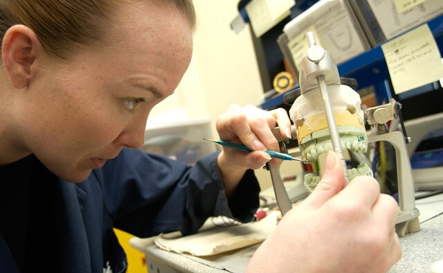 Staff Sgt. Tracy Roberts works on a patient's molding Feb. 6. She is a 36th Medical Group dental laboratory technician. The 36th MDOS dental clinic received the Air Force Small Dental Clinic of the Year Award for 2006. (U.S. Air Force photo/Senior Airman Miranda Moorer)