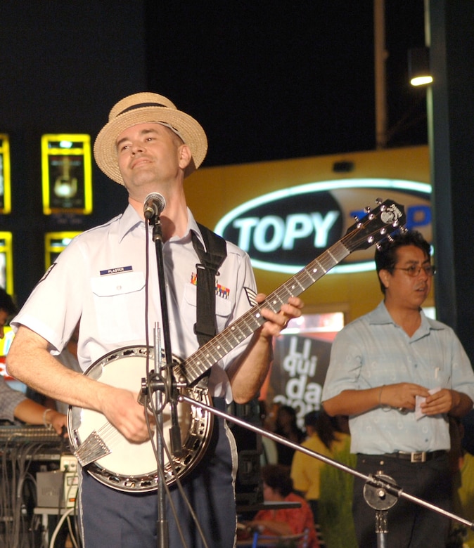 Staff Sgt. Daniel Plaster plays at a mall in Chiclayo, Peru. Sergeant Plaster, along with six other band members from the Air National Guard Band of the Southwest, were in Peru to support the Falcon and Condor 2007, a joint military exercise and air show that provides the U.S. Air Force the opportunity to work together and build relationships with military and civilian leaders of Peru. (U.S. Air Force photo/Tech. Sgt. Kerry Jackson)