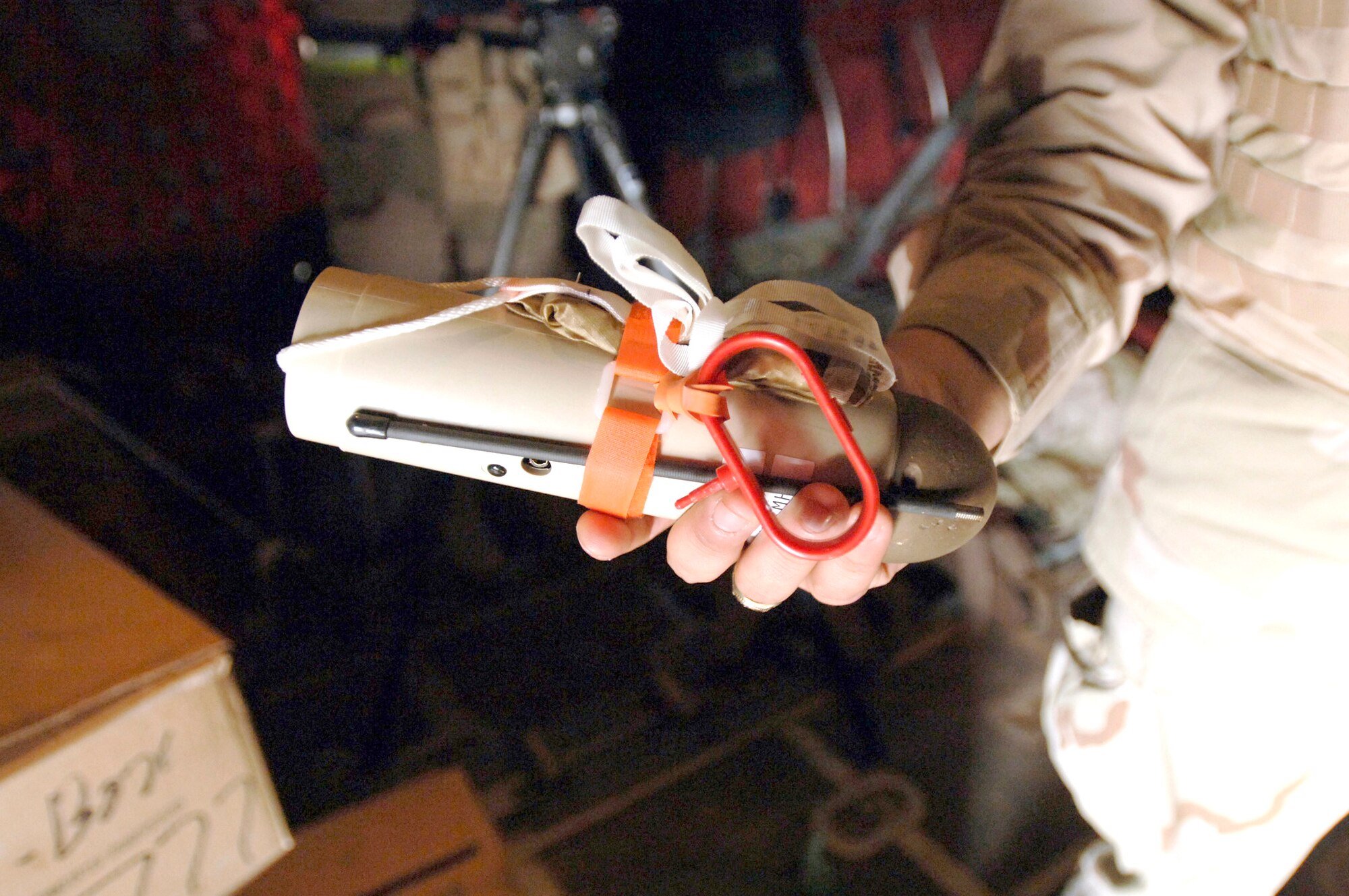 Using the Joint Precision Airdrop System in combination with the Improved Container Delivery System, a C-130 Hercules aircrew was able to drop cargo at higher altitudes with improved accuracy over Iraq Feb. 16. This wind sonde device, part of the JPADS, is dropped at high altitudes over a drop zone to measure winds prior to an actual cargo drop. This allows C-130 aircrews to drop cargo at safe distances from enemy fire. (U.S. Air Force photo/Tech. Sgt. Cecilio M. Ricardo Jr.) 