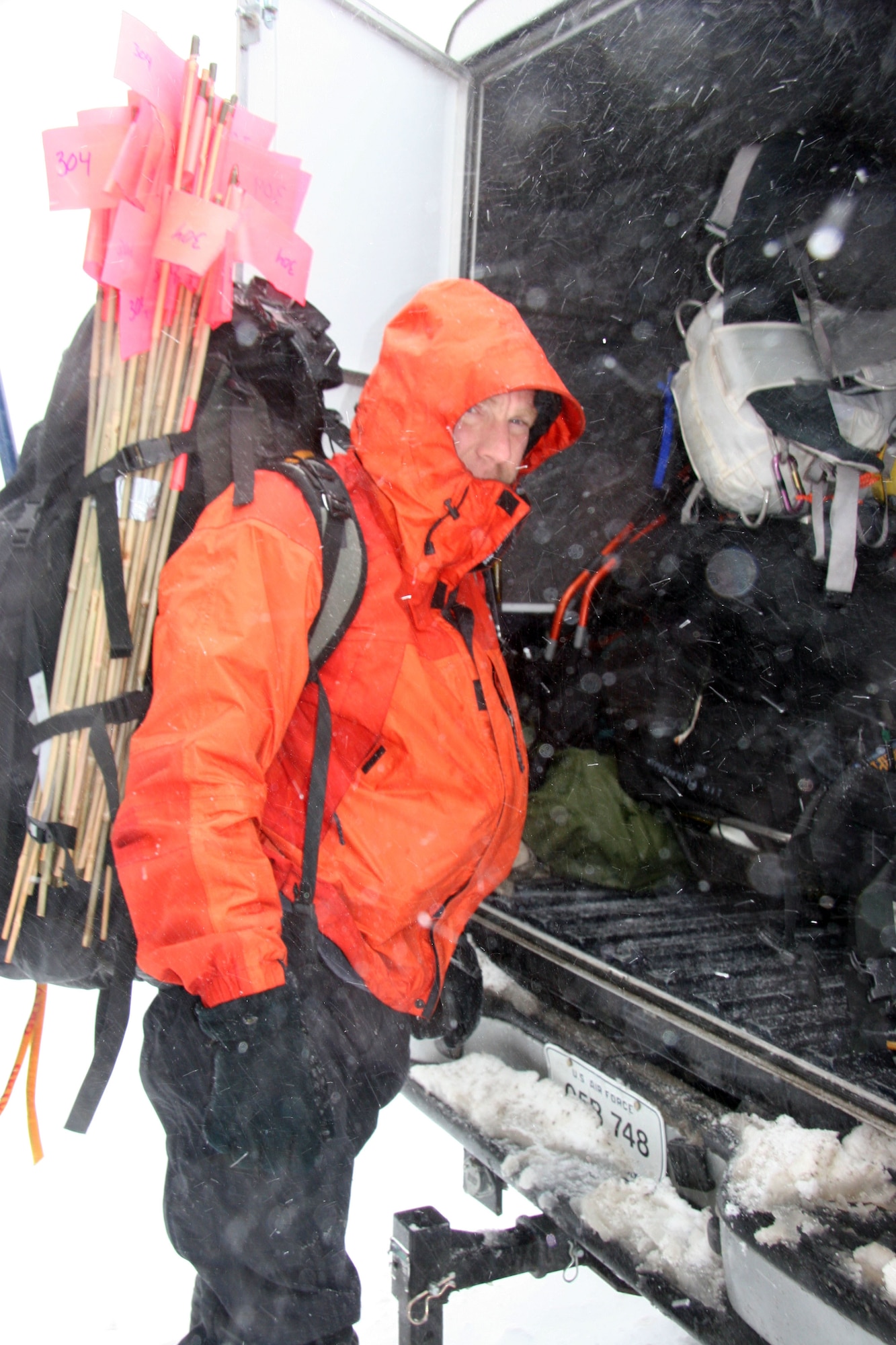 Capt. Mark Ross, 304th Rescue Squadron combat rescue officer loads up his rescue gear Feb 19, 2007 after spending the night on Mount Hood searching for more than 13 hours for three missing climbers who fell while climbing Sunday.  (Air Force Photo/Master Sgt. Ruby Zarzyczny) 