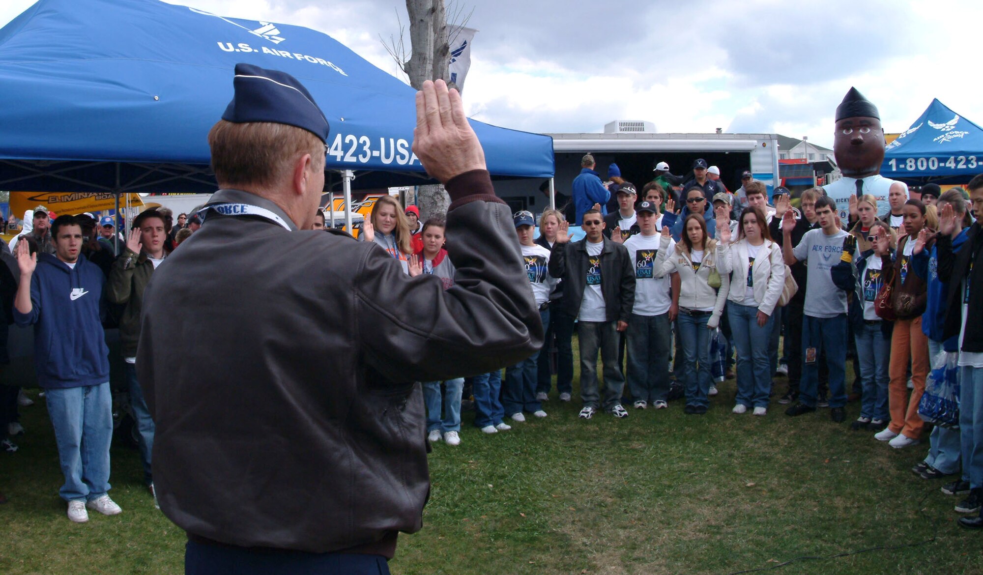 Gen. Ronald Keys, Air Combat Command commander, gives the oath of enlistment Feb. 18 to 36 delayed-entry-program recruits from the local area before the Daytona 500 race in Daytona Beach, Fla.  Afterward, the new Airmen and the general were treated to a tour of the garage and pit areas before the race.  The Air Force is one of the sponsors of the No. 21 Wood Brothers car driven by Ken Schrader.  (U.S. Air Force photo/Staff Sgt. Samuel King Jr.)