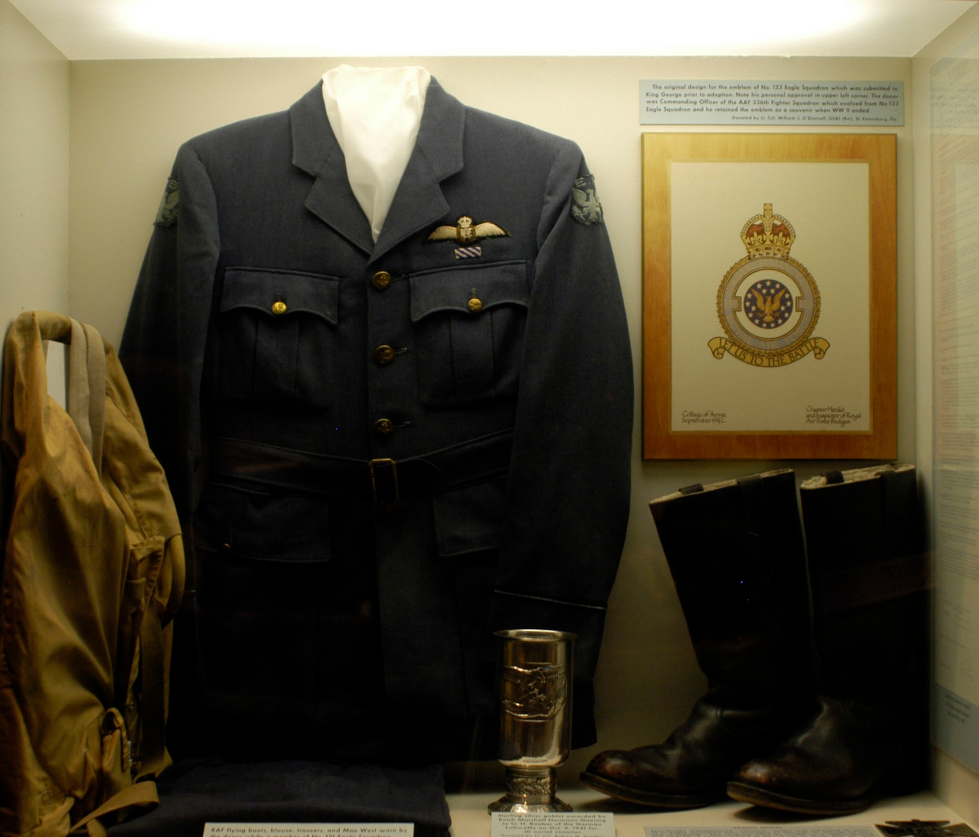 DAYTON, Ohio - RAF flying boots, blouse, trousers and Mae West on display in the Early Years Gallery at the National Museum of the U.S. Air Force. The uniform was worn by Col. Reade Tilley, USAF retired, while a member of the No. 121 Eagle Squadron. (U.S. Air Force photo)