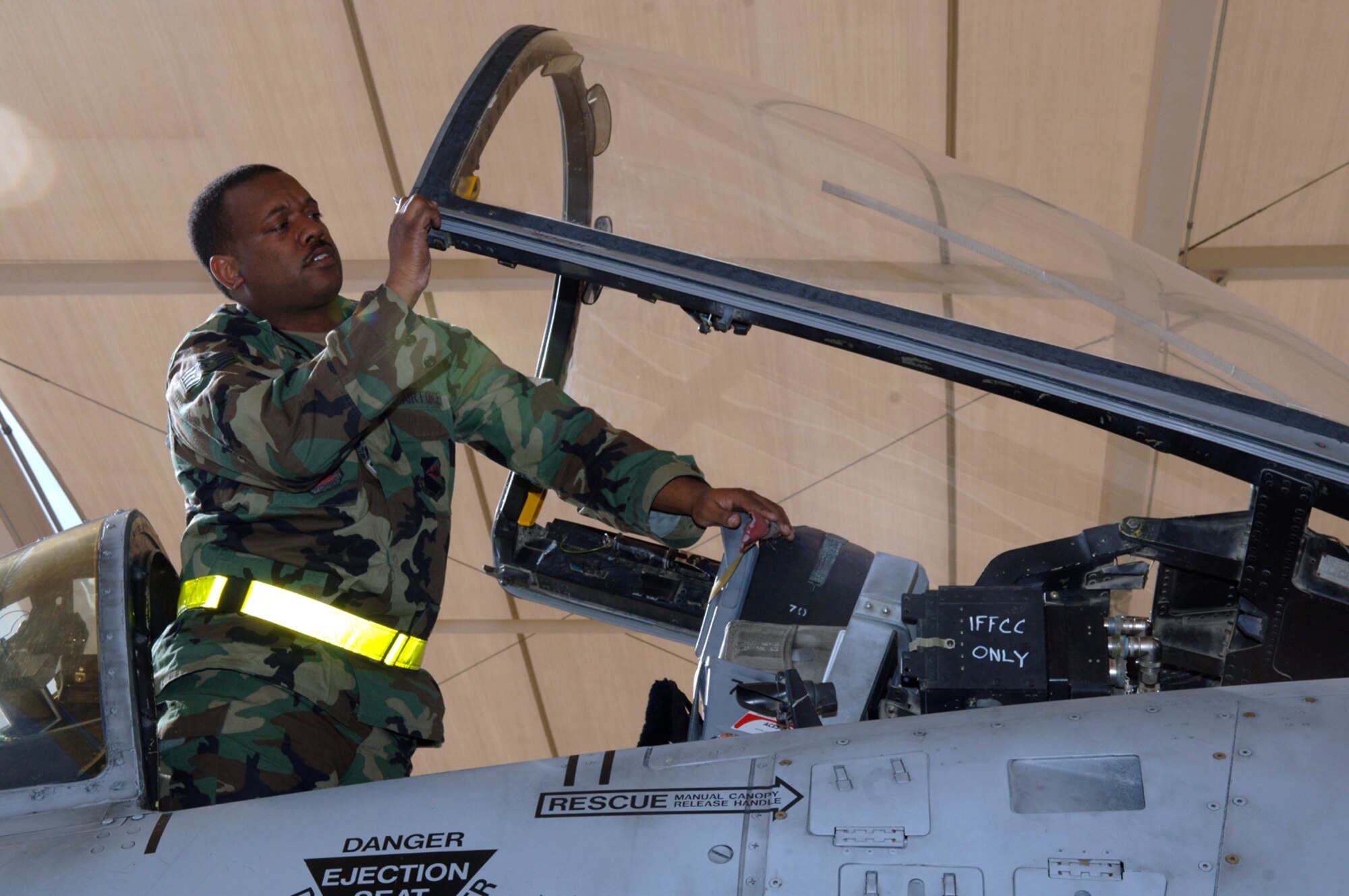 Staff Sgt. Michael Sangfield performs a maintenance inspection on an A-10 Thunderbolt II Feb. 17 during an operational readiness exercise at Davis-Monthan Air Force Base, Ariz., being conducted by the Air Combat Command inspection team. The ACC inspectors test the ability of 355th Wing Airmen to prepare to deploy and fight when called.  Sergeant Sangfield is an egress journeyman assigned to the 355th Maintenance Group.  (U.S. Air Force photo/Senior Airman Christina D. Ponte)
