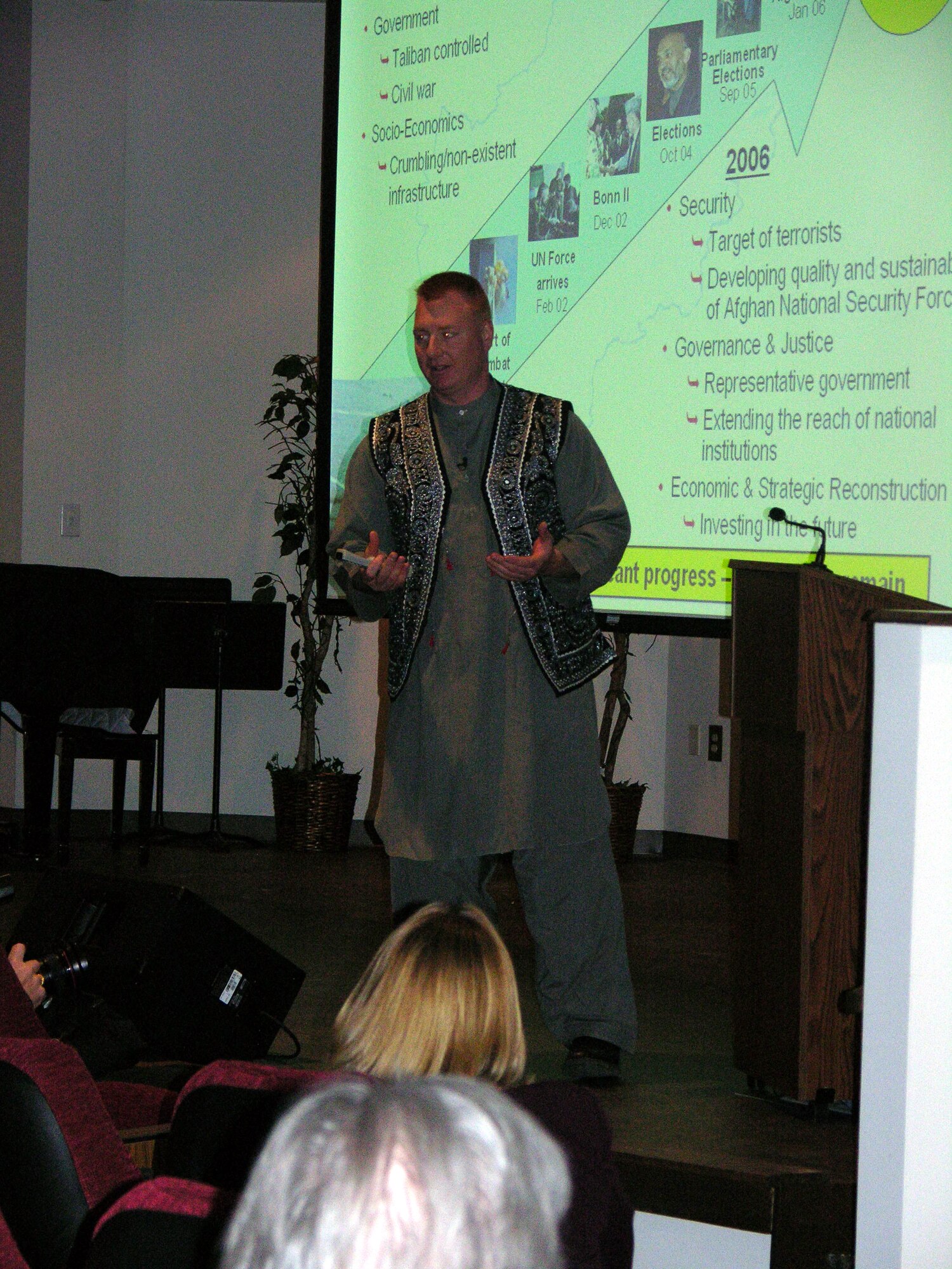 Capt. Ted Janicki, a reservist with the 916th Air Refueling Wing and a professor at Mt. Olive College, gave a presentation to more than a 100 people in mid-February while home on leave from Afghanistan. Capt. Janicki volunteered to serve a year tour in the Middle Eastern country starting last summer and while home on leave decided to share his experiences with the local community. Capt. Janicki, dressed in authentic Afghani garb, a gift from his interpreter, is helping Afghan troops learn about the communications career field. (U.S. Air Force photo/ Ms. Donna Lea)
       