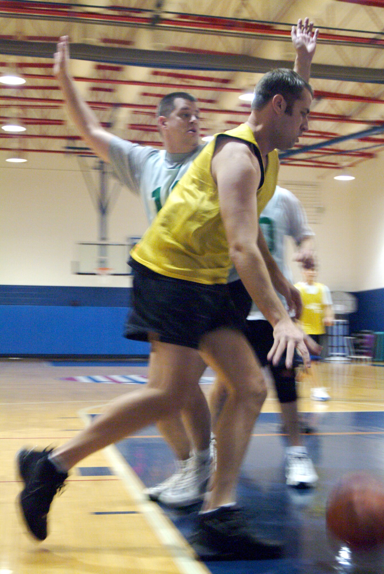 John Schriever drives to the inside of the key along the baseline Feb. 15 on the way to a victory by the 442nd Fighter Wing's over-30 intramural basketball team over the 509th Security Forces Squadron for the Whiteman base championship. (U.S. Air Force photo/Maj. David Kurle)