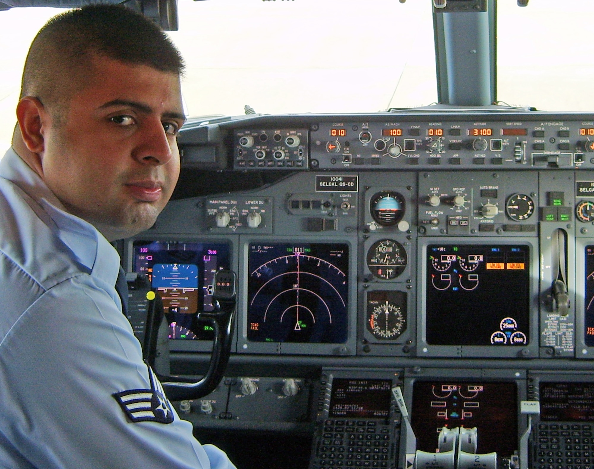 Senior Airman J.R. Smith tours a C-32 Aircraft as part of his interview for a position as Flight Attendent for the 89th Airlift Wing at Andrews AFB. The 89th Airlift Wing provides global Special Air Mission airlift, logistics, aerial port and communications for the nation's top leaders.