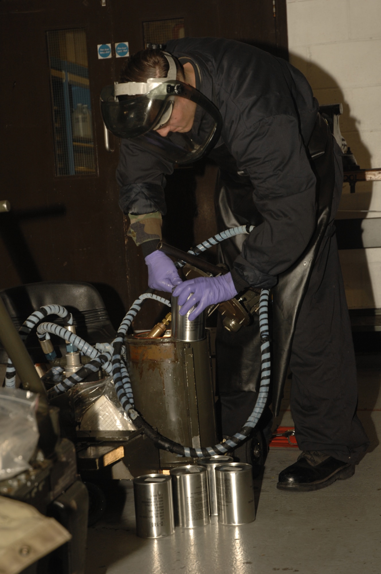 Airman 1st Class Benjamin Peterson, 48th EMS, trouble shoots an oil carton for leaks.
Airman Peterson is part of the aerospace ground equipment flight which maintains
equipment used to re-supply RAF Lakenheath’s F-15C Eagles and F-15E Strike
Eagles. (Air Force photo by Airman 1st Class Jessica Snow)
