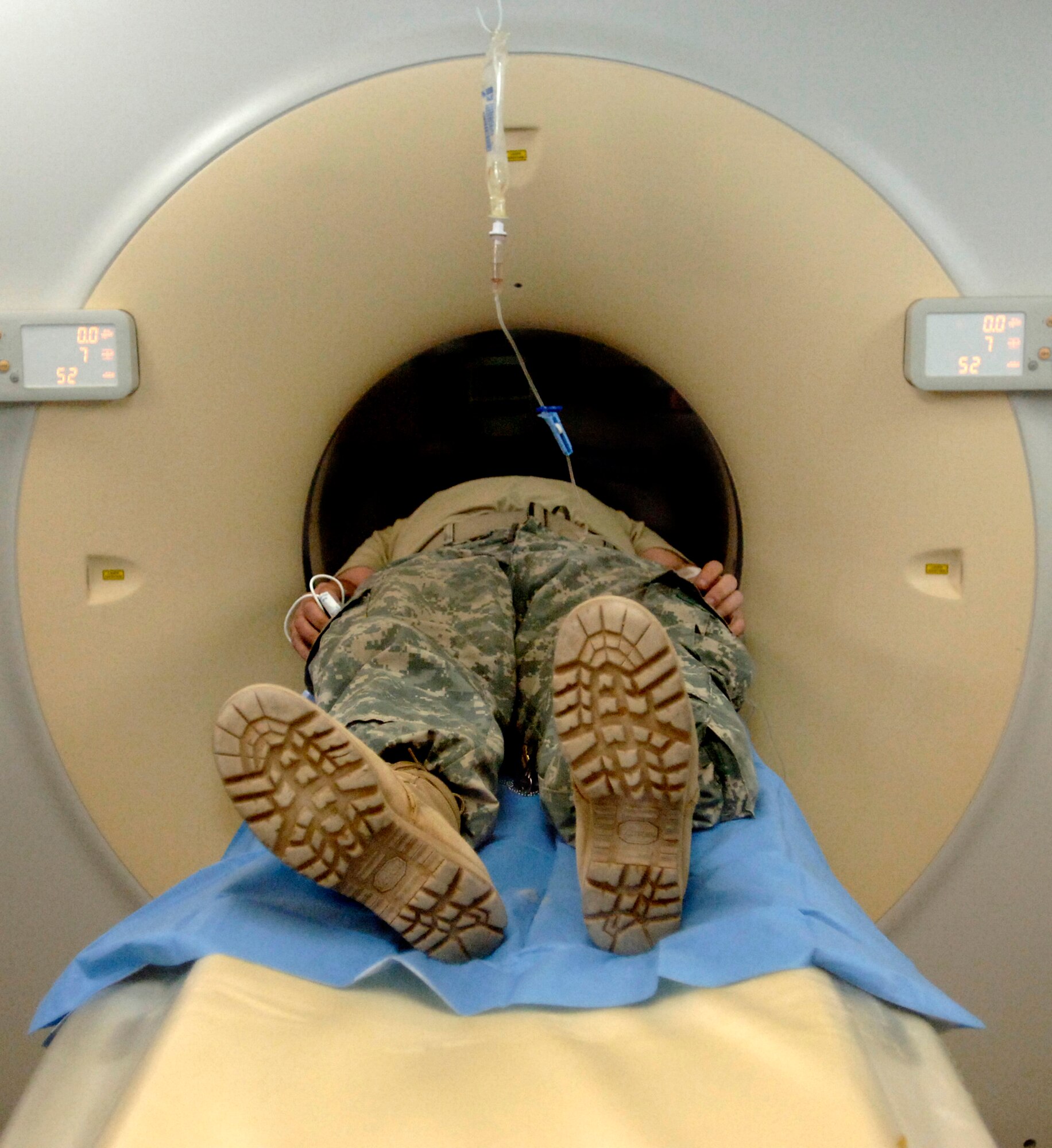 A Soldier goes through a CT scan at the Air Force Theater Hospital Feb. 19 at Balad Air Base, Iraq. The radiology staff has two new 16 slice CT scanners that expedite the process from 90 minutes to about 10 minutes. (U.S. Air Force photo/Tech. Sgt. Cecilio M. Ricardo Jr.)

