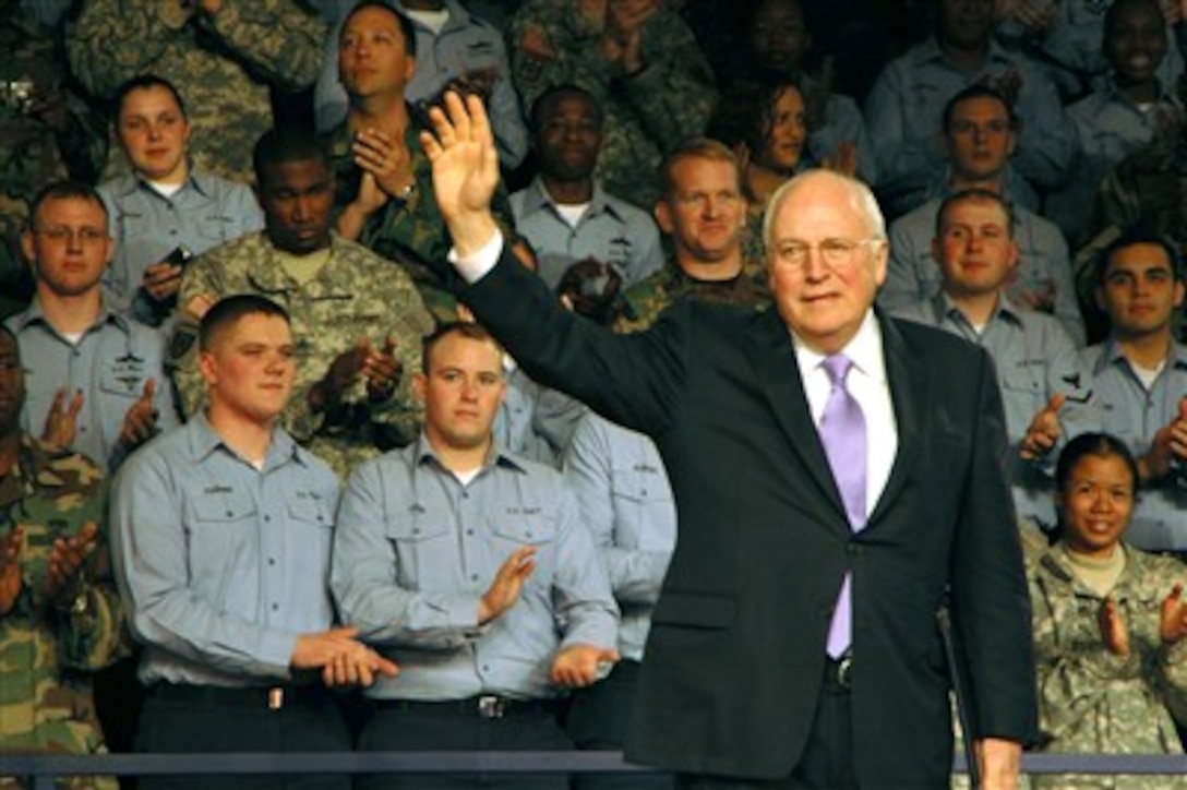 Vice President Dick Cheney waves to the audience after speaking to military personnel, family members and Department of Defense civilian employees during a visit to the USS Kitty Hawk, Yokosuka, Japan, Feb. 21, 2007. Cheney is in Japan during a week-long tour of the Pacific.