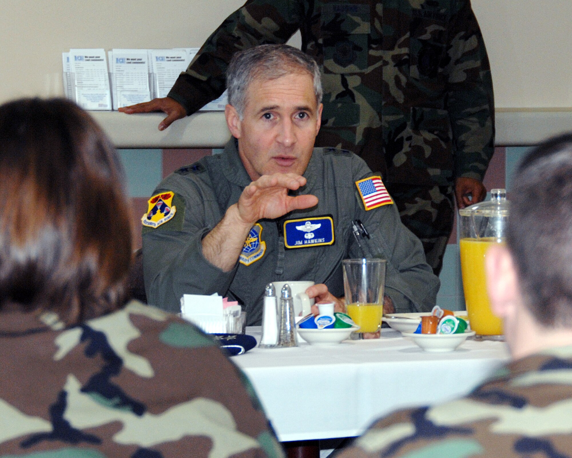 Maj. Gen. James Hawkins, 18th Air Force commander, answers questions from Travis Airmen during a breakfast at the Sierra Inn Dining Facility Feb. 15. (U.S. Air Force photo by David Cushman)