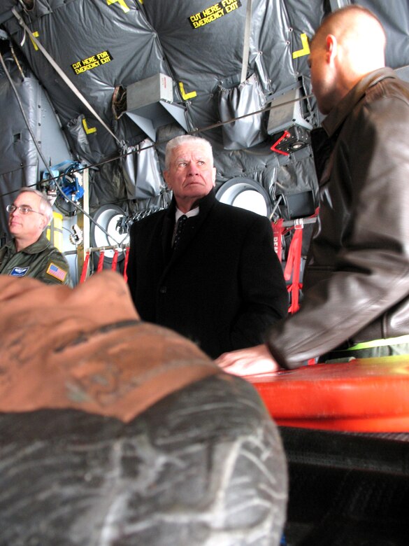 Dr. William Plested gets a briefing about aeromedical evacuation procedures on a C-130 Hercules by Tech. Sgt. Phillip Gettins Feb. 22 at Ramstein Air Base, Germany. Dr. Plested is the president of the American Medical Association and was visiting Ramstein AB to see firsthand how military medicine gets wounded troops back home. (U.S. Air Force photo/Staff Sgt. Laura Holzer) 
