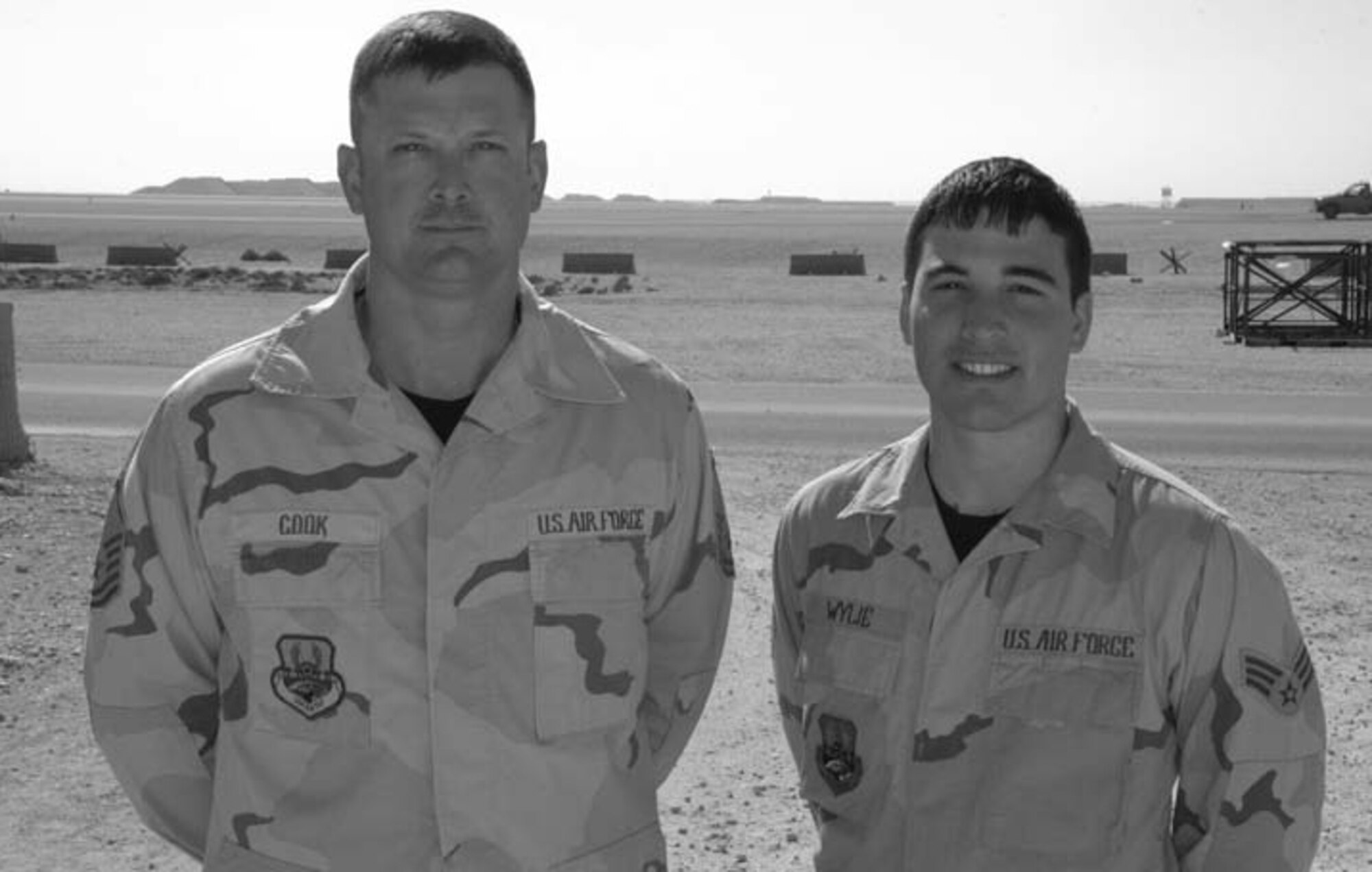 Master Sgt. Brent Cook dislodged food from a choking Senior Airman Joseph Wylie, while deployed to Southwest Asia. Both are deployed from the 319th Aircraft Maintenance Squadron. (Courtesy photo)
