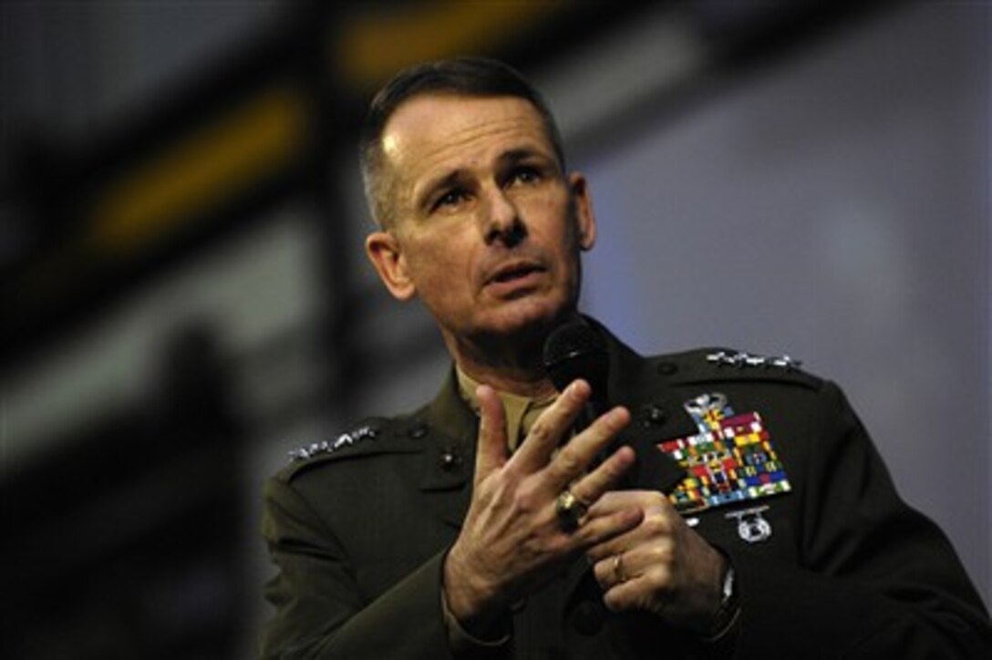 Chairman of the Joint Chiefs of Staff Gen. Peter Pace, U.S. Marine Corps, answers a question from a student at Hudson Bay High School in Vancouver, Wash., on Feb. 21, 2007.  Pace talked to an audience of approximately 5000 high school students, members of the public, officials and military personnel from the region.  