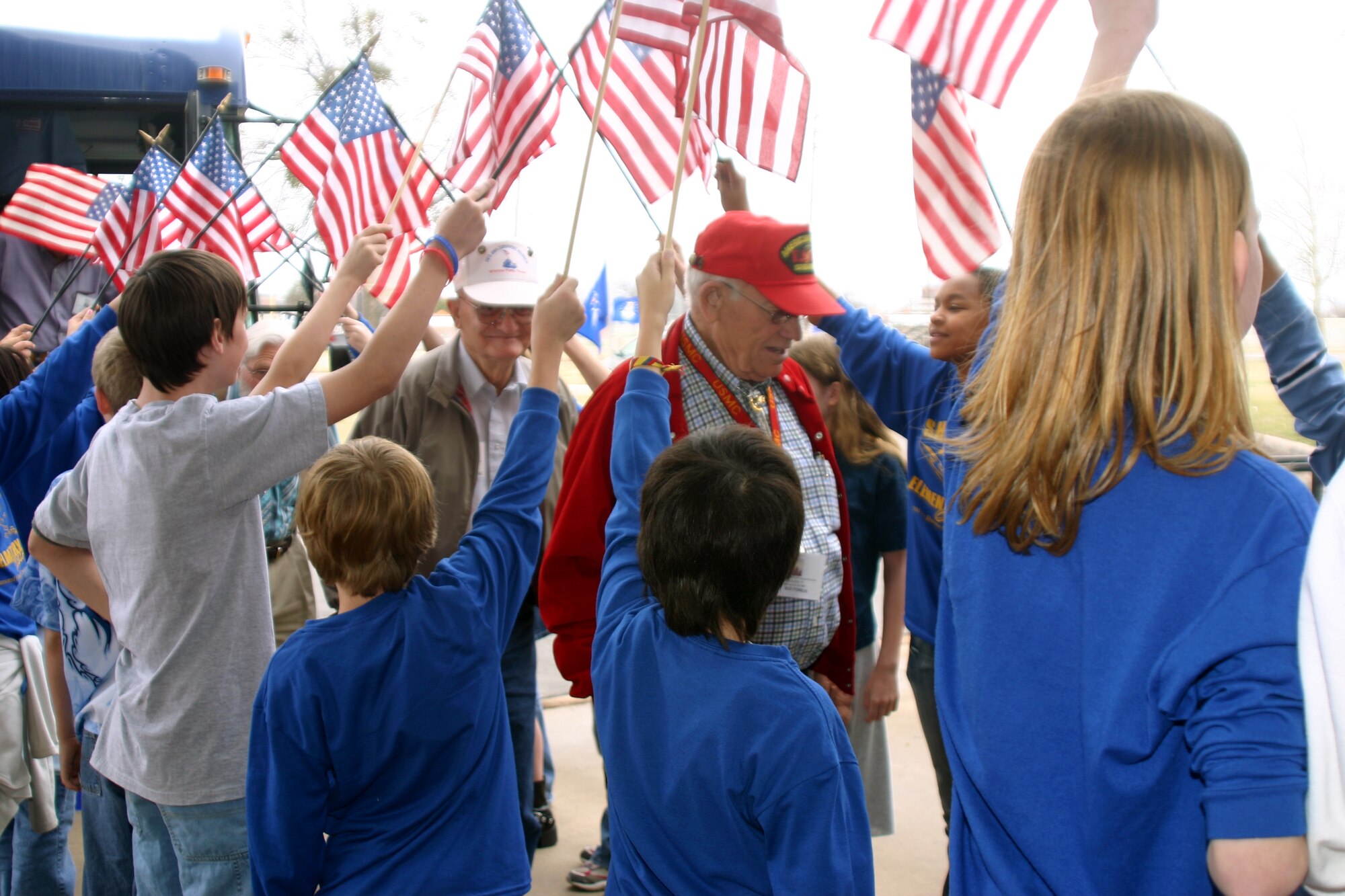 Bud Forbus and Frank Jones are among the Iwo Jima veterans welcomed by Sheppard Elementary School students during the vets' tour of the base Feb. 23. (U.S. Air Force Photo/Staff Sgt. Tonnette Thompson)