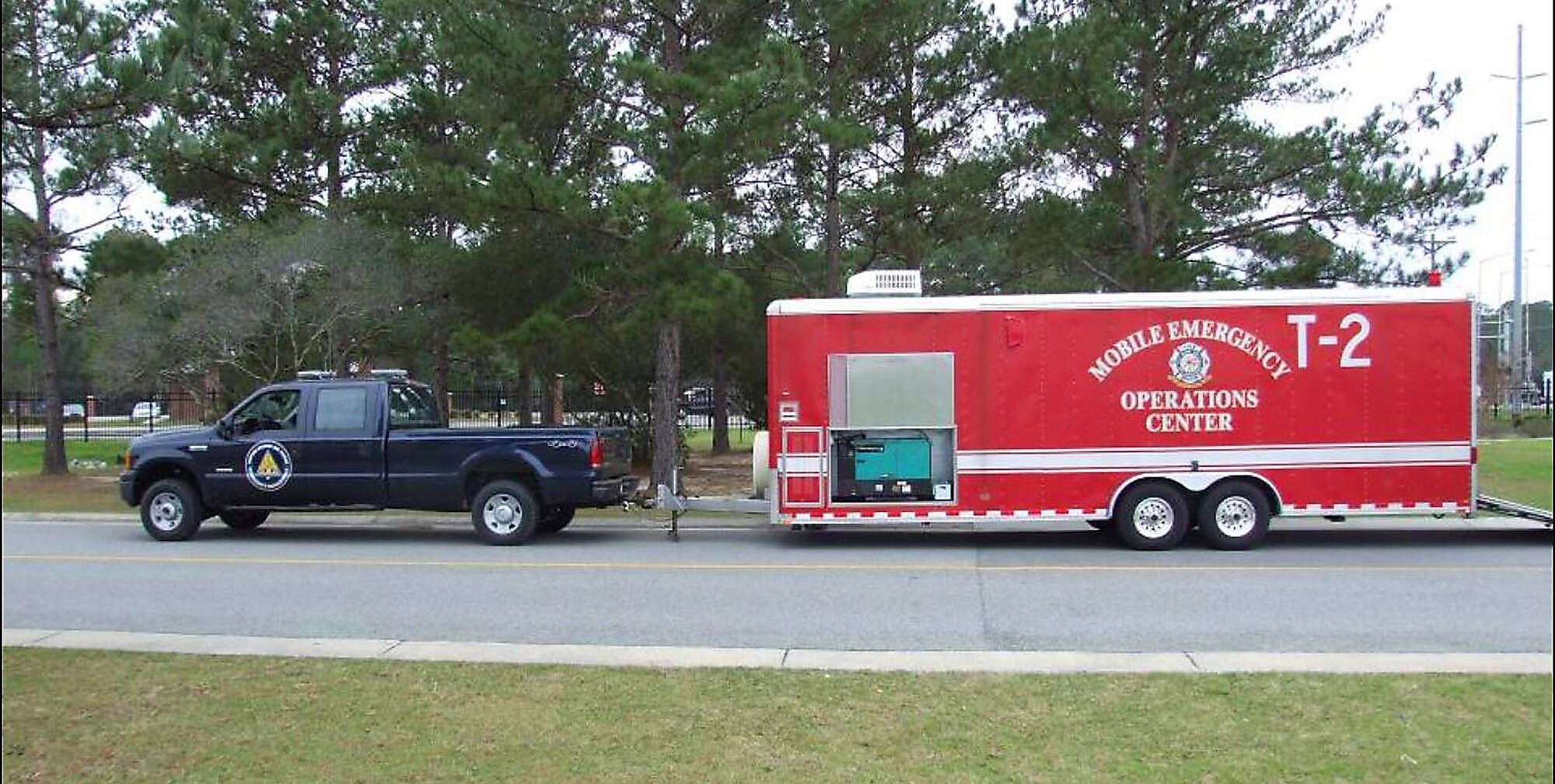 The 23rd Civil Engineer Squadron mobile emergency operations center provides a long-term command center for large operations in and around Moody Air Force Base, Ga. The unit is outfitted with an on-board computer network, video projection equipment, tents and generators for a large team of emergency responders. The center also features a built-in communications center to keep the primary EOC abreast of the latest developments. (U.S. Air Force photo courtesy of the 23rd Civil Engineer Squadron)