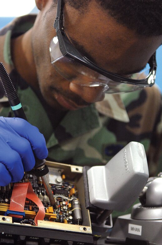 MCCHORD AIR FORCE BASE, Wash., -- Senior Airman Tyran Stockard, 62nd Maintenance Squadron avionics intermediate section technician, replaces the transistor on a line-replacement unit Feb. 5 in the AIS shop located in Bldg. 1119. (U.S. Air Force photo by Abner Guzman) 