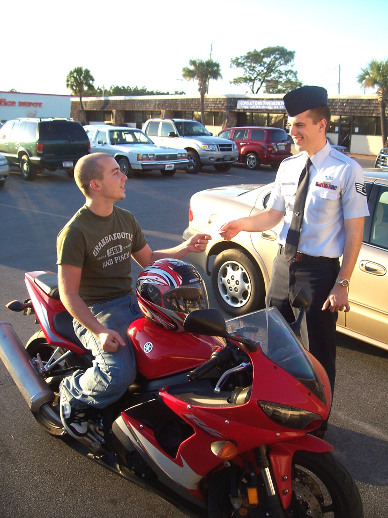 Troy Roberts, Mosely High School student, tallks with Staff Sgt. Aaron Brown, Air Force recruiter, about joining the Air Force.