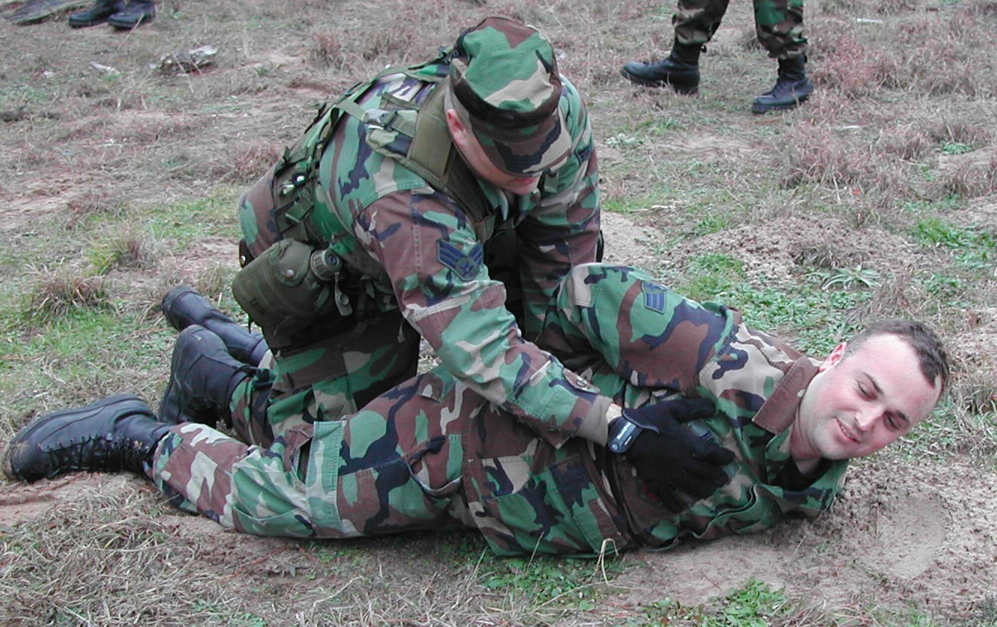 GRISSOM AIR RESERVE BASE, Ind., -- Senior Airman Jacob Johnston, 434th Security Forces Squadron, performs a search on a suspect apprehended during a training scenario at Camp Swift, Texas. Fourty-one members of the 434th SFS travelled to Camp Swift to participate in Patriot Defender, a two-week refresher exercise designed to help keep combat skills keen for security members. (U.S. Air Force photo/Staff Sgt. Andrew Julius)