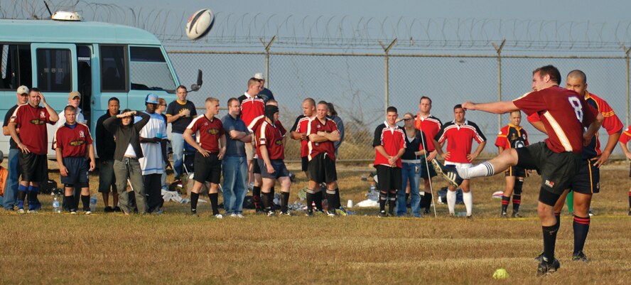 OSAN AIR BASE, Republic of Korea --  After scoring a try, outgoing Osan team captain Michael “Hamma” Peecook, makes good on the two-point conversion. Six teams from around the peninsula traveled to Osan to participate in the Halloween Rugby 10s Tournament. (U.S. Air Force photo by Staff Sgt. Josh Klahn)