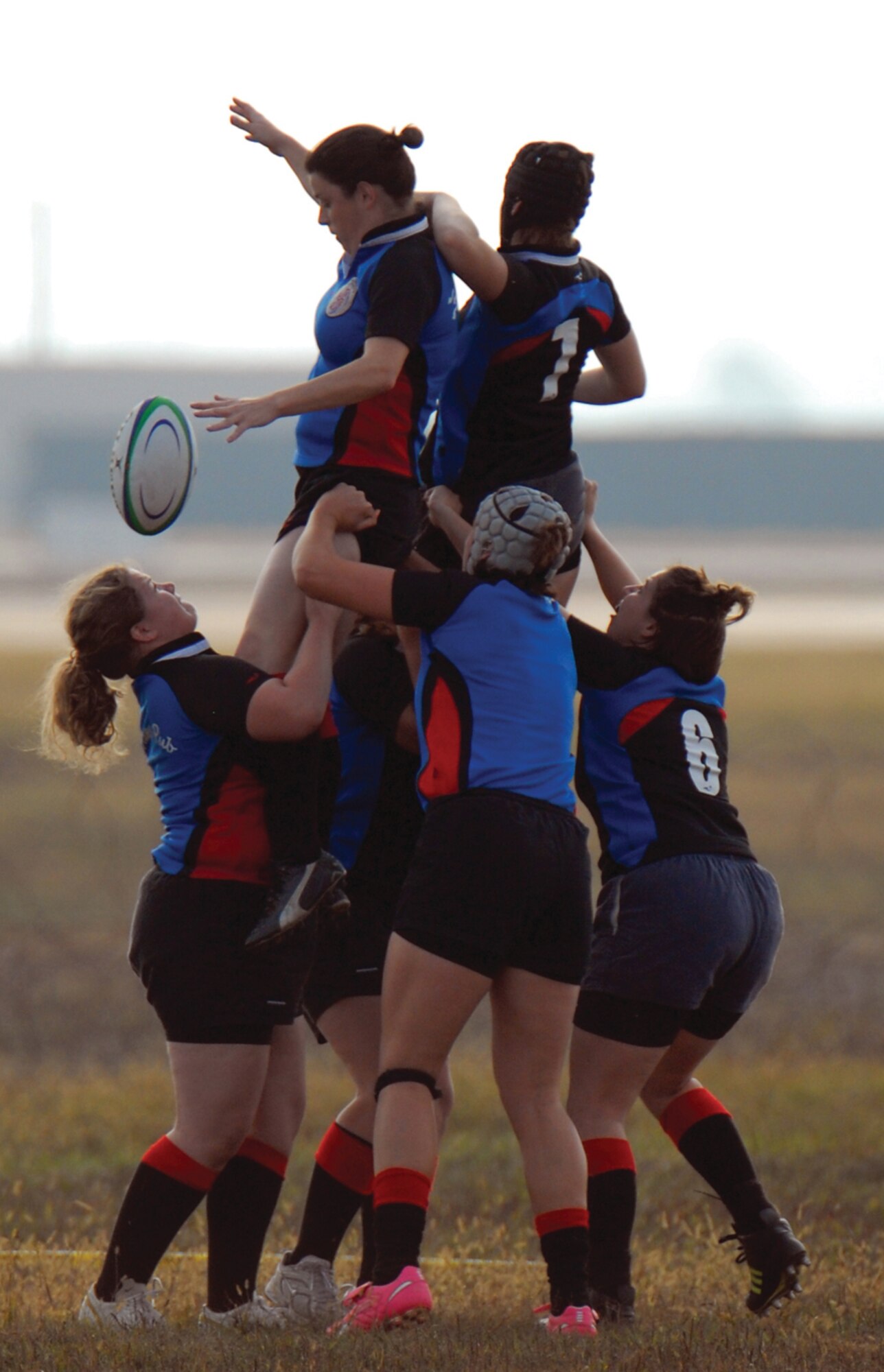OSAN AIR BASE, Republic of Korea --  Two female teams battle for the line out at the Halloween Rugby 10s Tournament. The teams that participated in the event included Camp Red Cloud, Camp Casey, three teams from Seoul and the Osan Rugby Club. (U.S. Air Force photo by Staff Sgt. Josh Klahn)