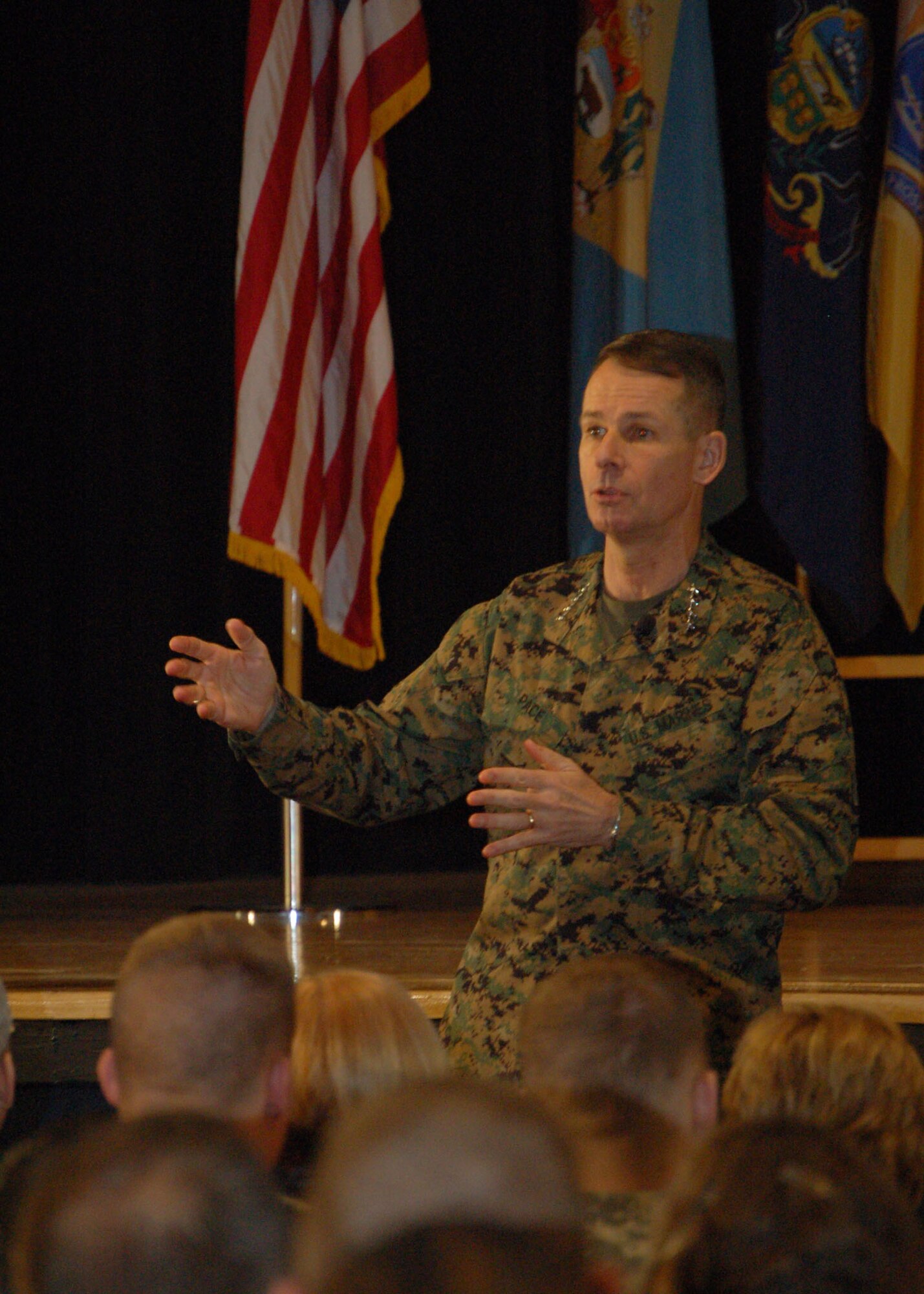 Chairman of the Joint Chiefs of Staff Marine Gen. Peter Pace answers a question during a town hall meeting at Elmendorf Air Force Base, Alaska, Feb. 23. (U.S. Air Force photo/Staff Sgt. Matthew Rosine) 
