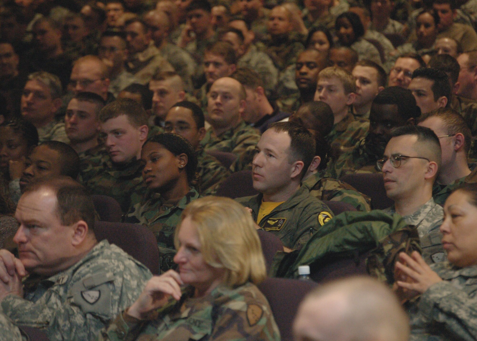 Airmen and Soldiers listen to Chairman of the Joint Chiefs of Staff Marine Gen. Peter Pace during a town hall meeting at Elmendorf Air Force Base, Alaska, Feb. 23. (U.S. Air Force photo/Staff Sgt. Matthew Rosine) 
