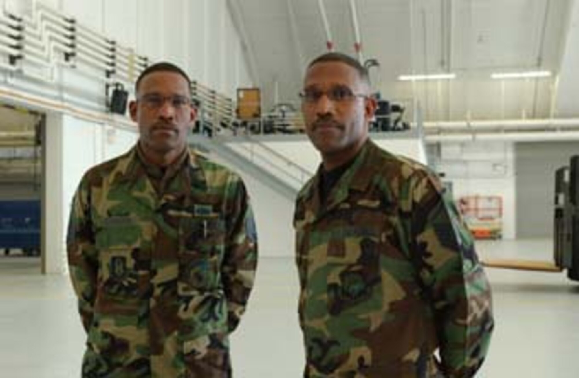 Master Sgts. Gary and Greg  Snowden, twin brothers who have both served in the 459th Air Refueling Wing during their entire Air Force career. (U.S. Air Force photo/Master Sgt. Shayne Sewell). 