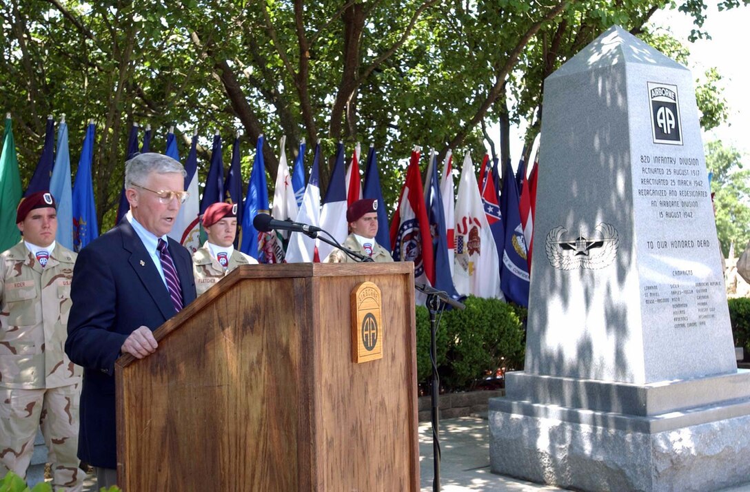 Retired Command Sgt. Maj. Steven R. England, former command sergeant major of the 82nd Airborne Division and the 18th Airborne Corps, speaks at a wreath-laying ceremony commemorating fallen paratroopers from all the 82nd's campaigns at the division's war memorial May 26. Photo by Pfc. Mike Pryor, USA