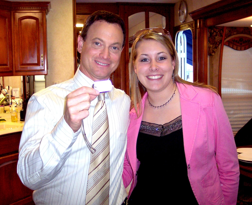 Actor Gary Sinise shows off his "America Supports You" dog tags while meeting with fellow military supporter Shauna Fleming, who has collected 1.4 million thank you letters for members of the U.S. armed forces. Courtesy photo