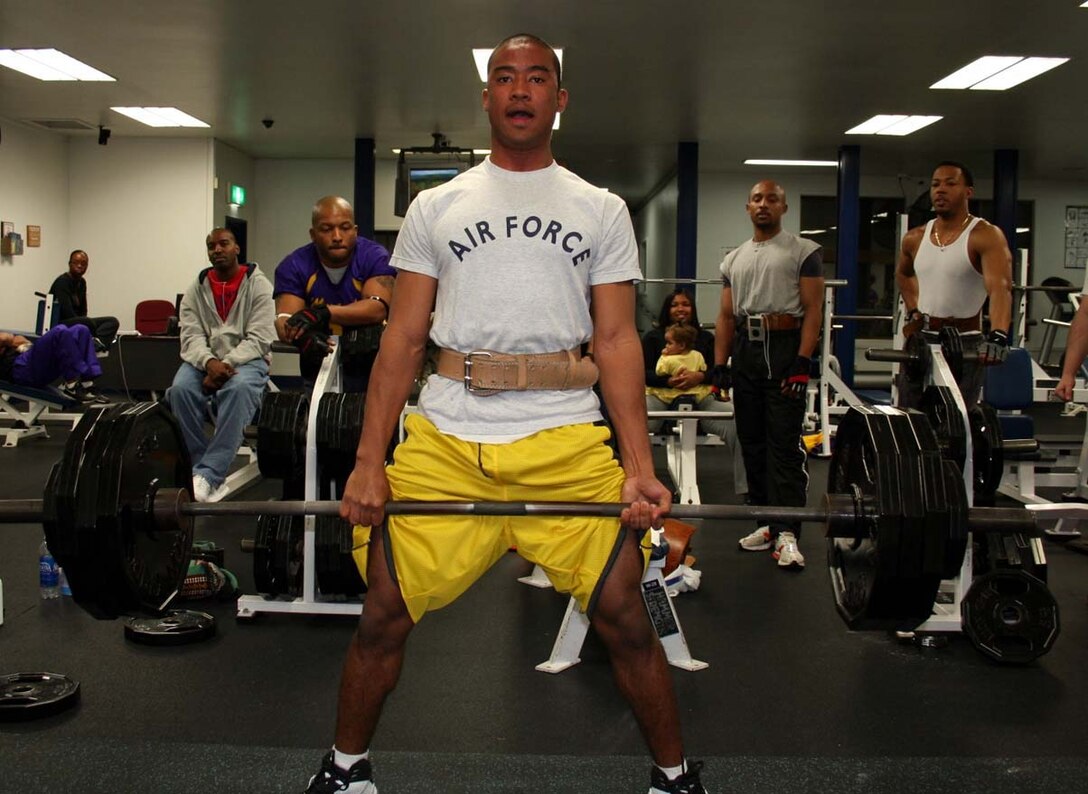 070217-- MISAWA AIR BASE, Japan -- Airman Narungchai Jackson, 35th Communication Squadron, with a total weight of 680 pounds during a weight lifting competition here at the Potter Fitness Center Feb. 17. Eighteen contestants competed in the bench press and dead lift in light, medium, and heavy weight divisions. (Courtesy photo)